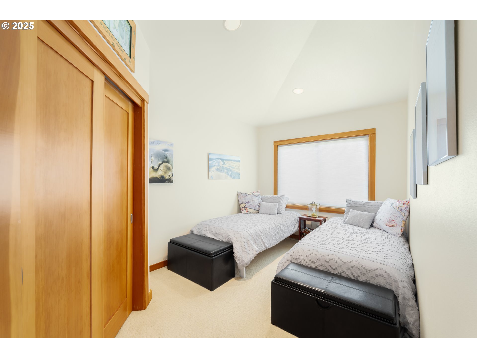 1950 Beach Loop Road Bandon, OR 97411 - Photo 36 of 45 a bedroom with two beds and a large mirror