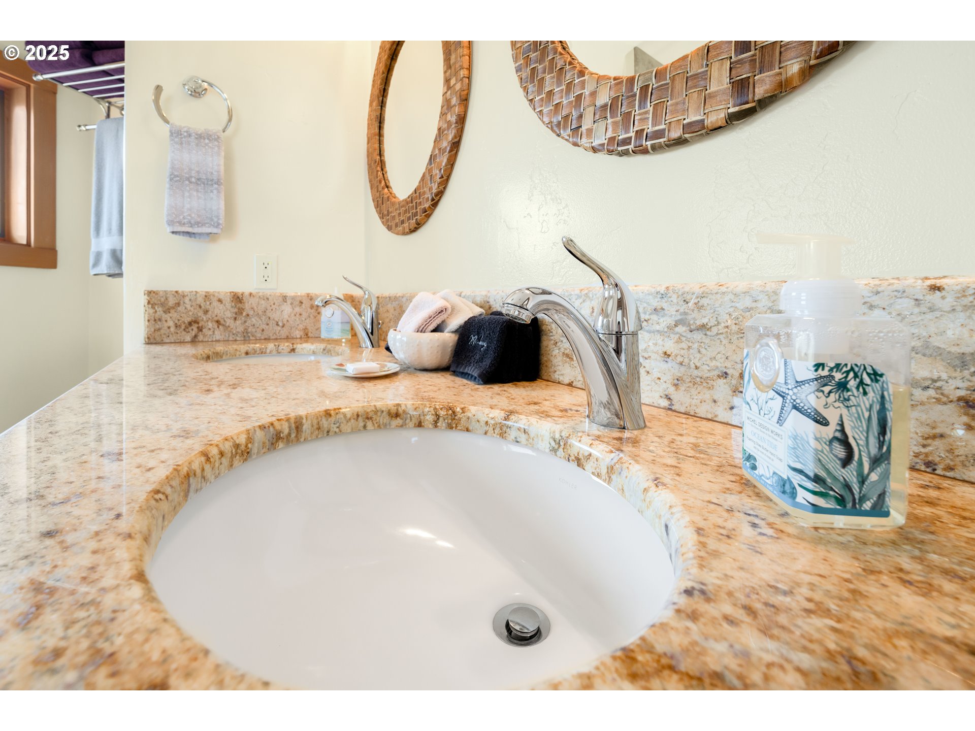 1950 Beach Loop Road Bandon, OR 97411 - Photo 41 of 45 a bathroom with a sink and a mirror