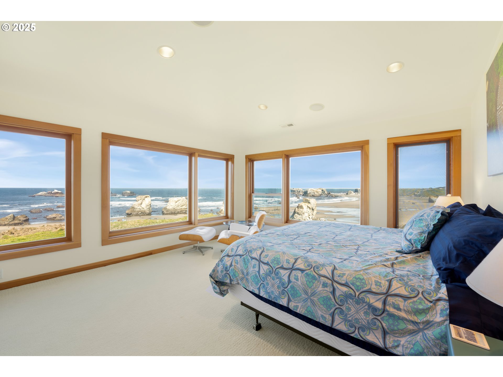 1950 Beach Loop Road Bandon, OR 97411 - Photo 42 of 45 a living room with a bed furniture and large window