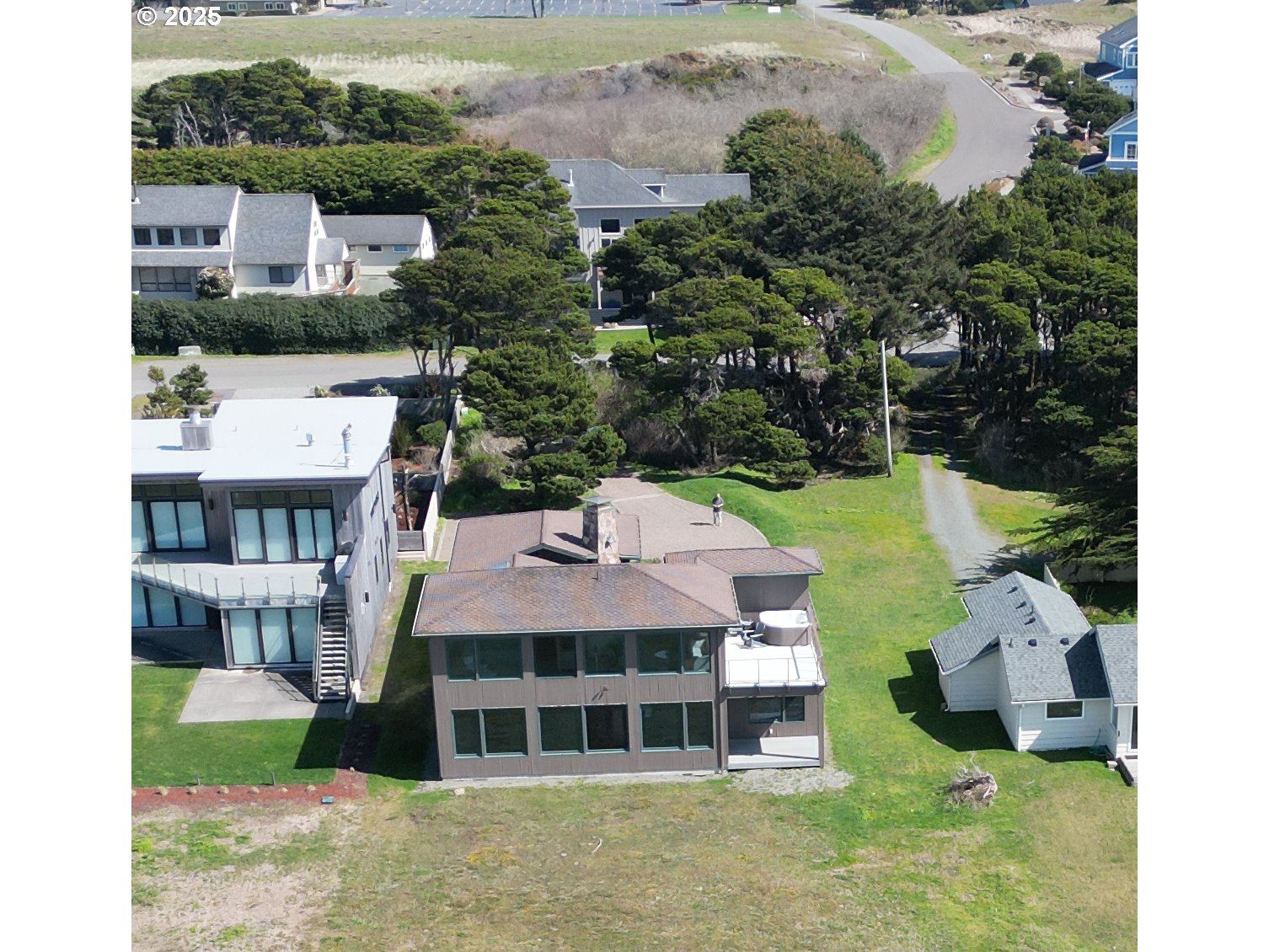 1950 Beach Loop Road Bandon, OR 97411 - Photo 5 of 45 a aerial view of a house with a yard