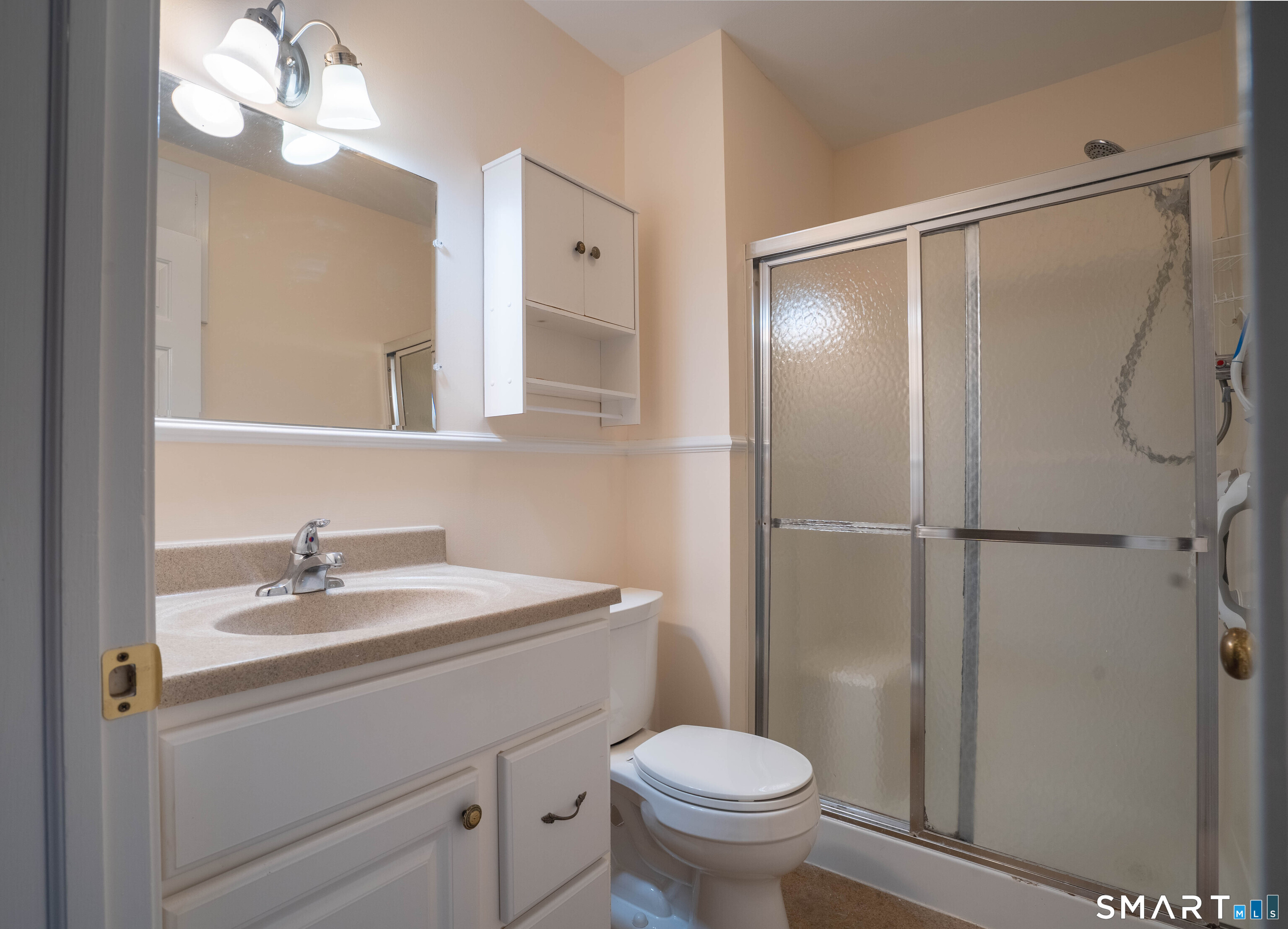 4 Currycross Road, Unit 4 Madison, CT 06443 - Photo 14 of 30 a bathroom with a sink toilet and shower