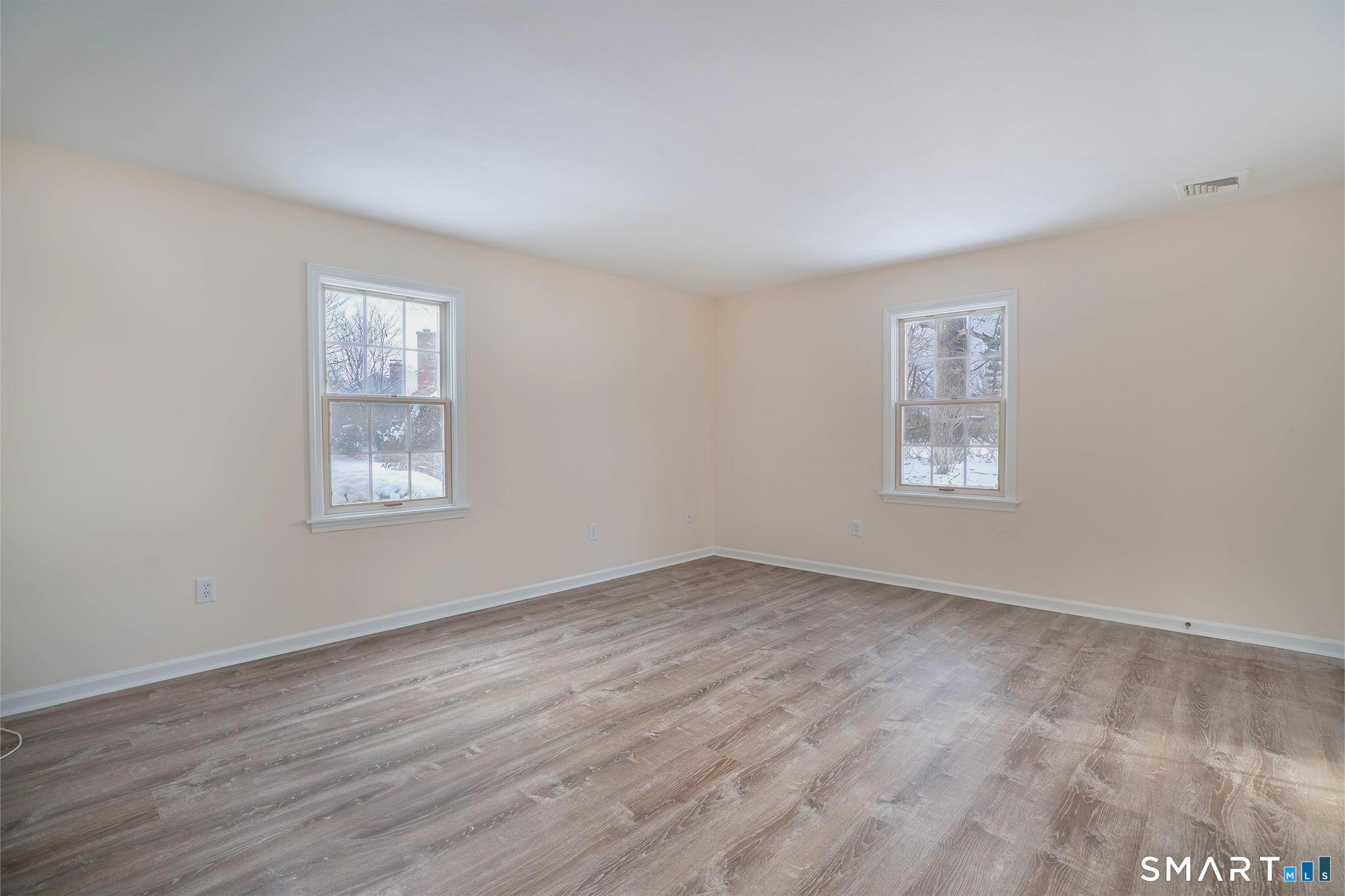 4 Currycross Road, Unit 4 Madison, CT 06443 - Photo 18 of 30 an empty room with windows