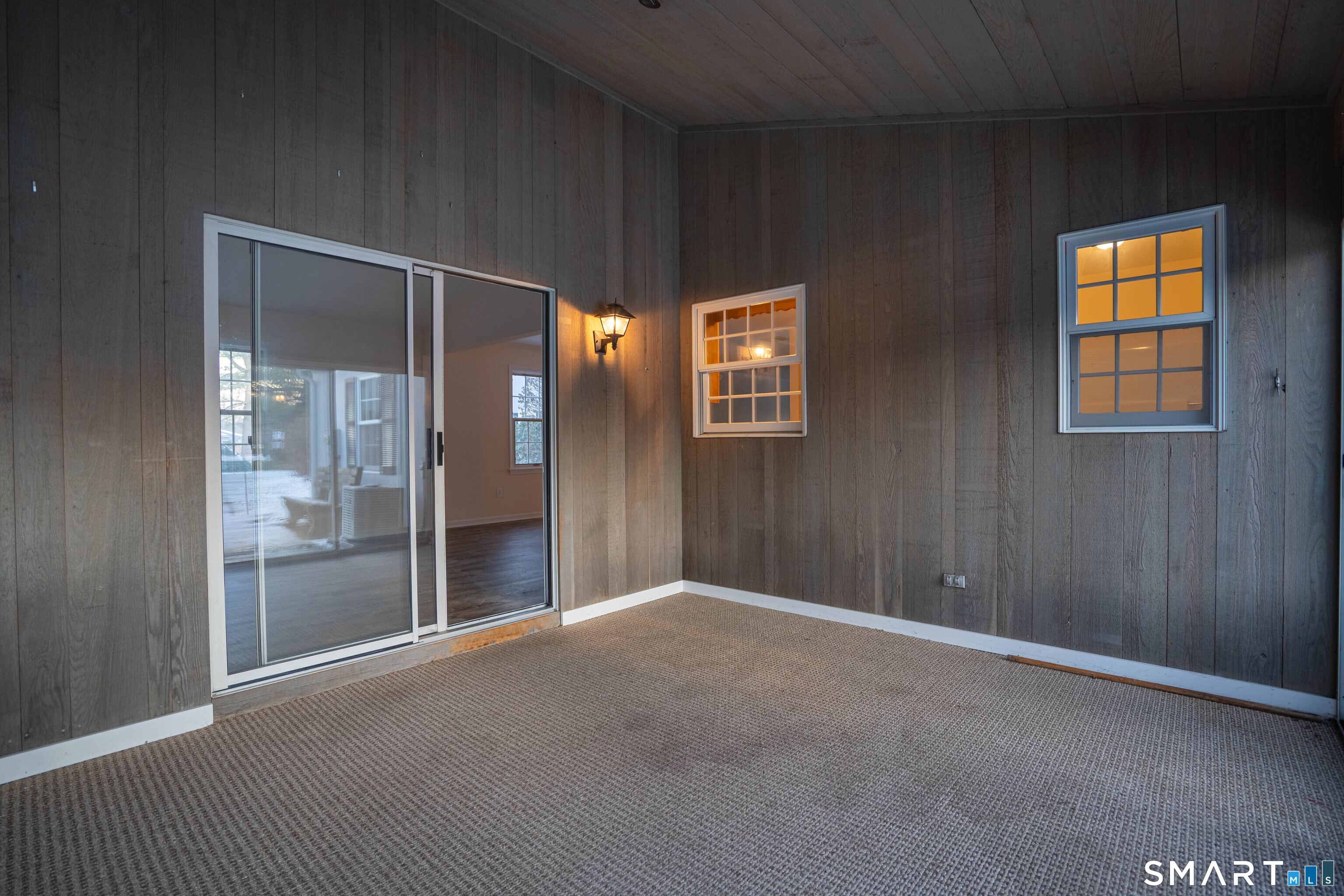 4 Currycross Road, Unit 4 Madison, CT 06443 - Photo 25 of 30 a view of an empty room with glass door