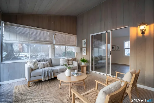 a view of a house with a yard and garage