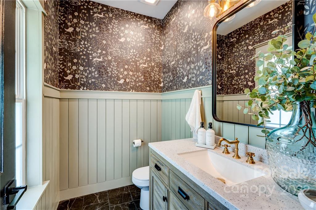 1842 Sam Smith Road Fort Mill, SC 29708 - Photo 5 of 28 a bathroom with a sink toilet and mirror