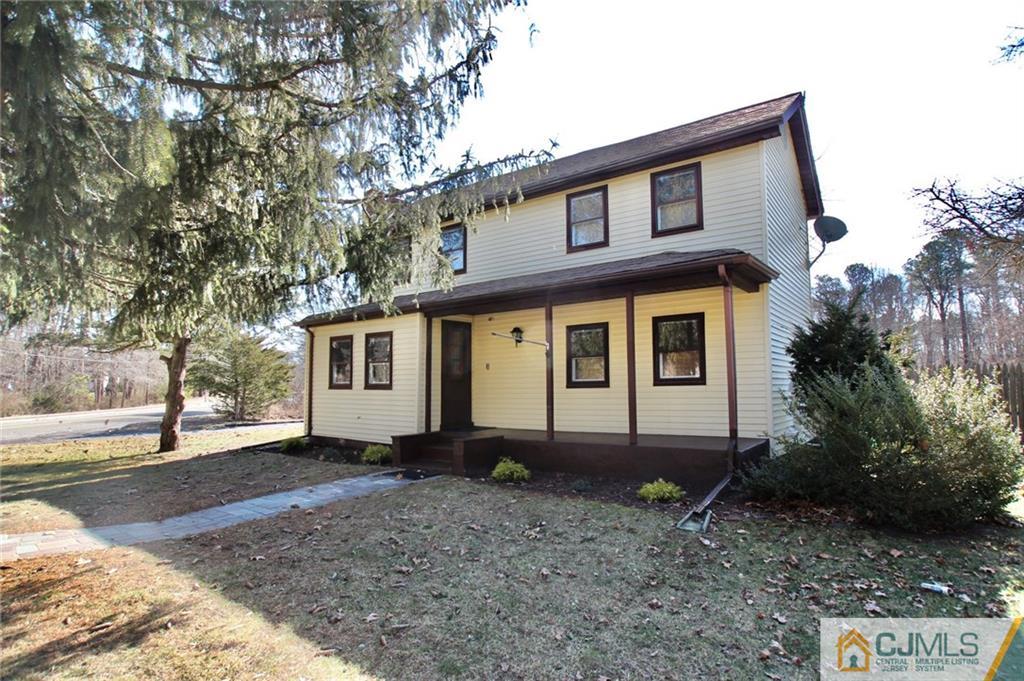 386 East Pleasant Grove Road Jackson, NJ 08527 - Photo 2 of 24 a view of a house with a yard and large tree