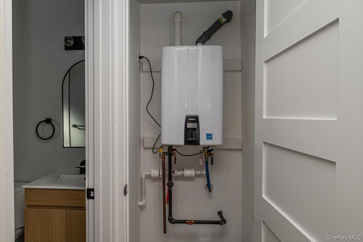 55 Alhambra Road Massapequa, NY 11758 - Photo 35 of 38 a bathroom with a shower