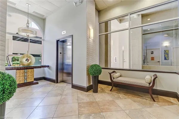 a living room with a couch and a table