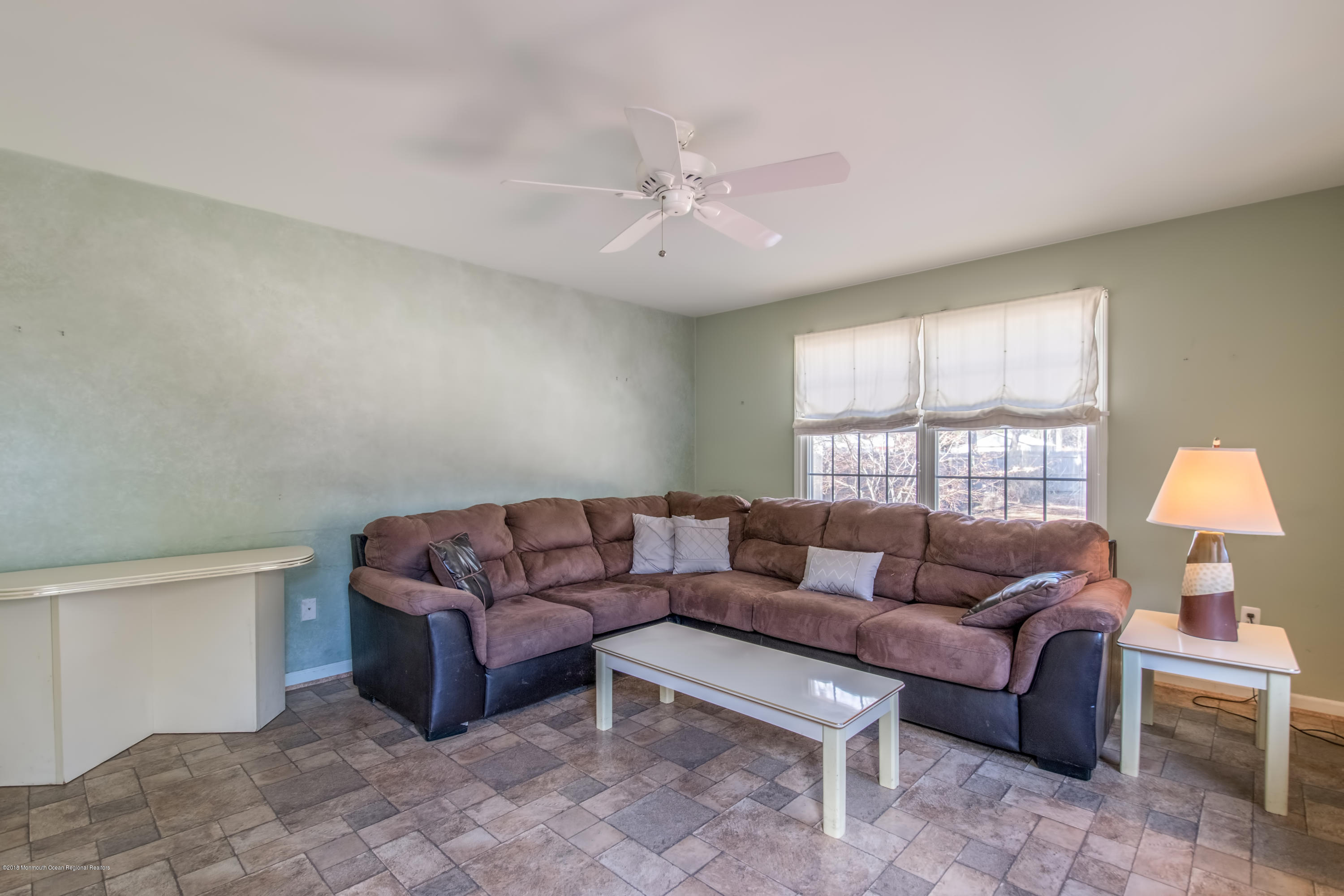 124 Marlin Road Manahawkin, NJ 08050 - Photo 12 of 34 a living room with furniture and a window