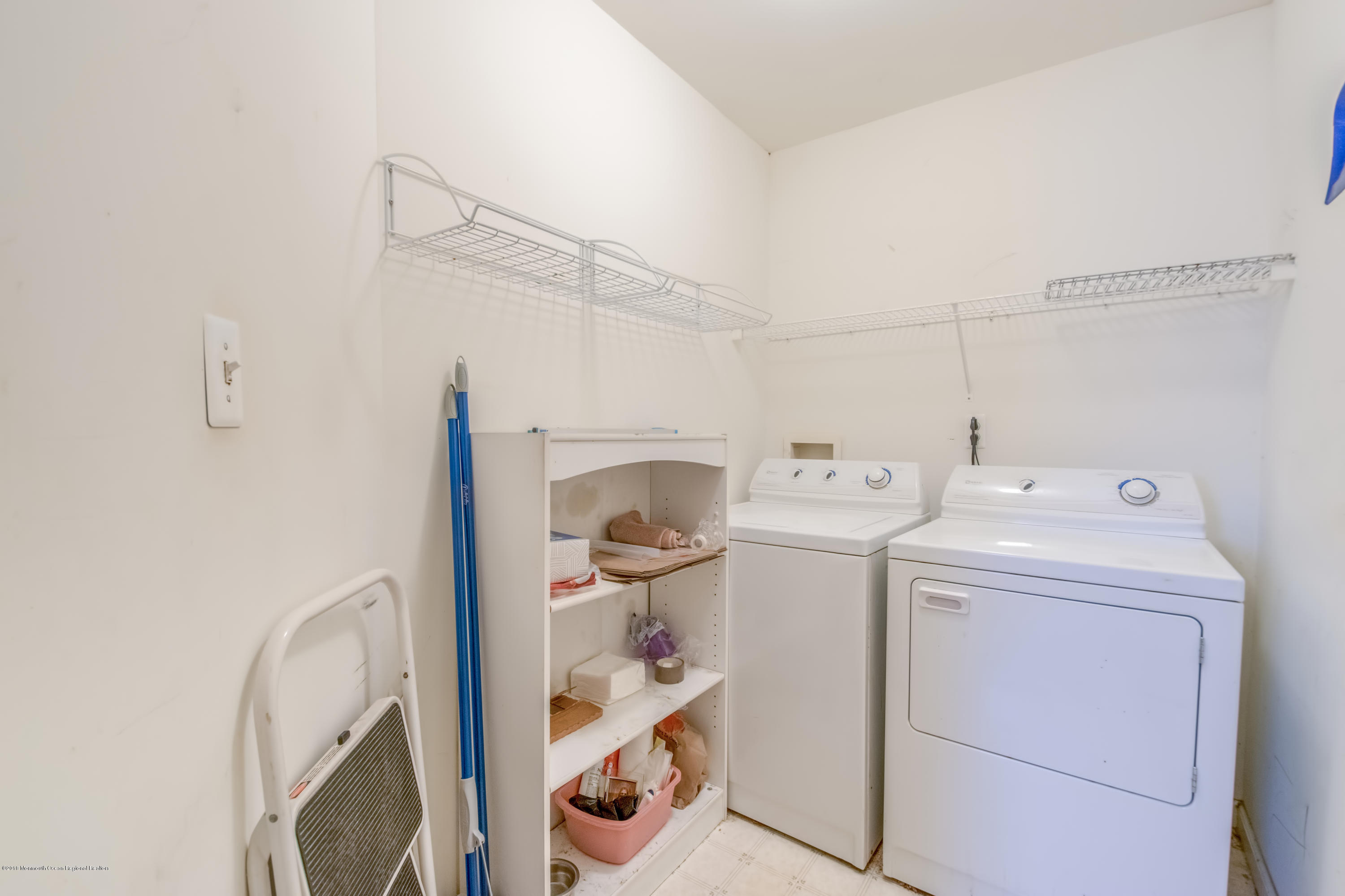 124 Marlin Road Manahawkin, NJ 08050 - Photo 19 of 34 a utility room with dryer and washer
