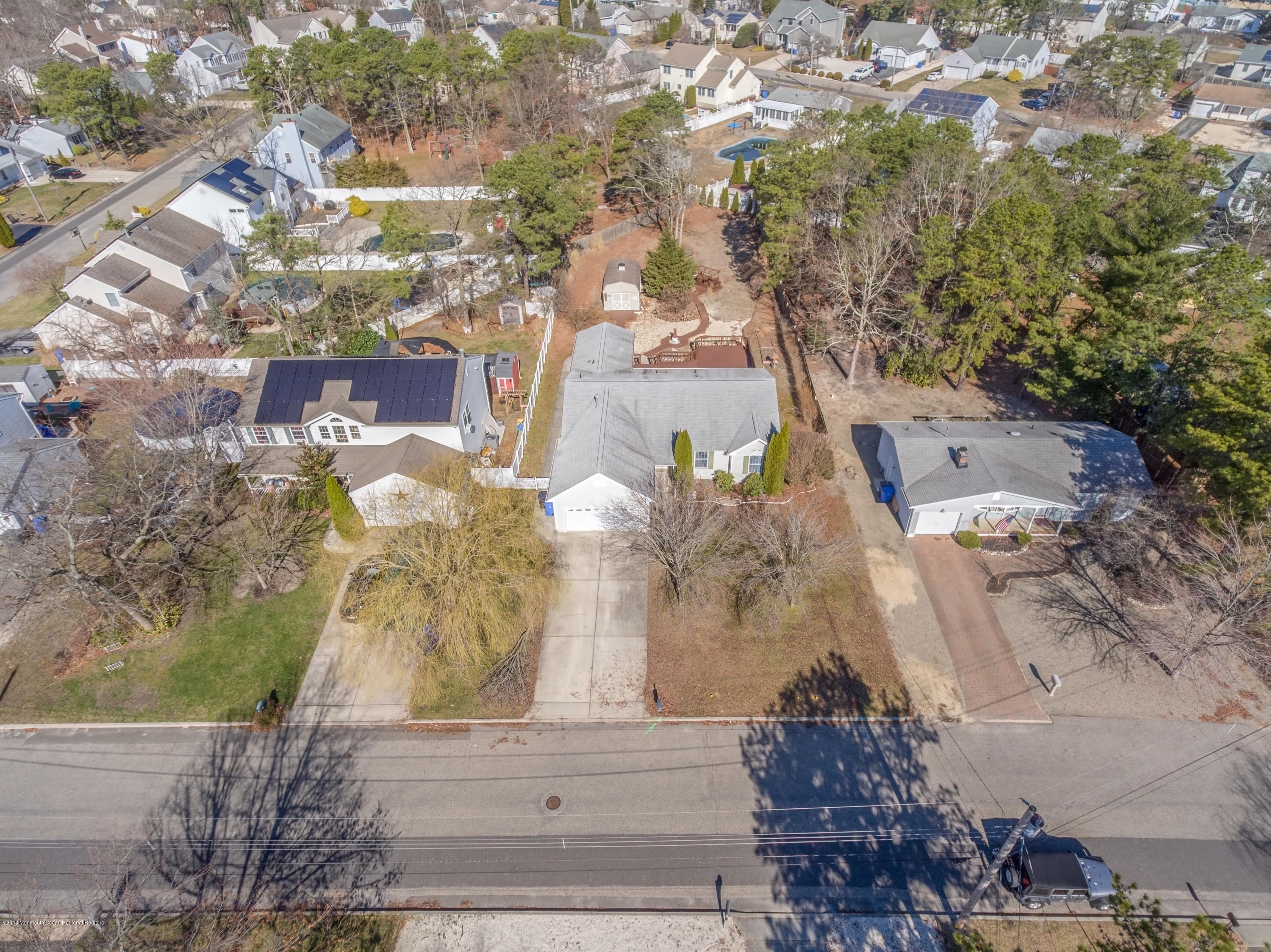 124 Marlin Road Manahawkin, NJ 08050 - Photo 27 of 34 an aerial view of a house with a yard and mountain view in back