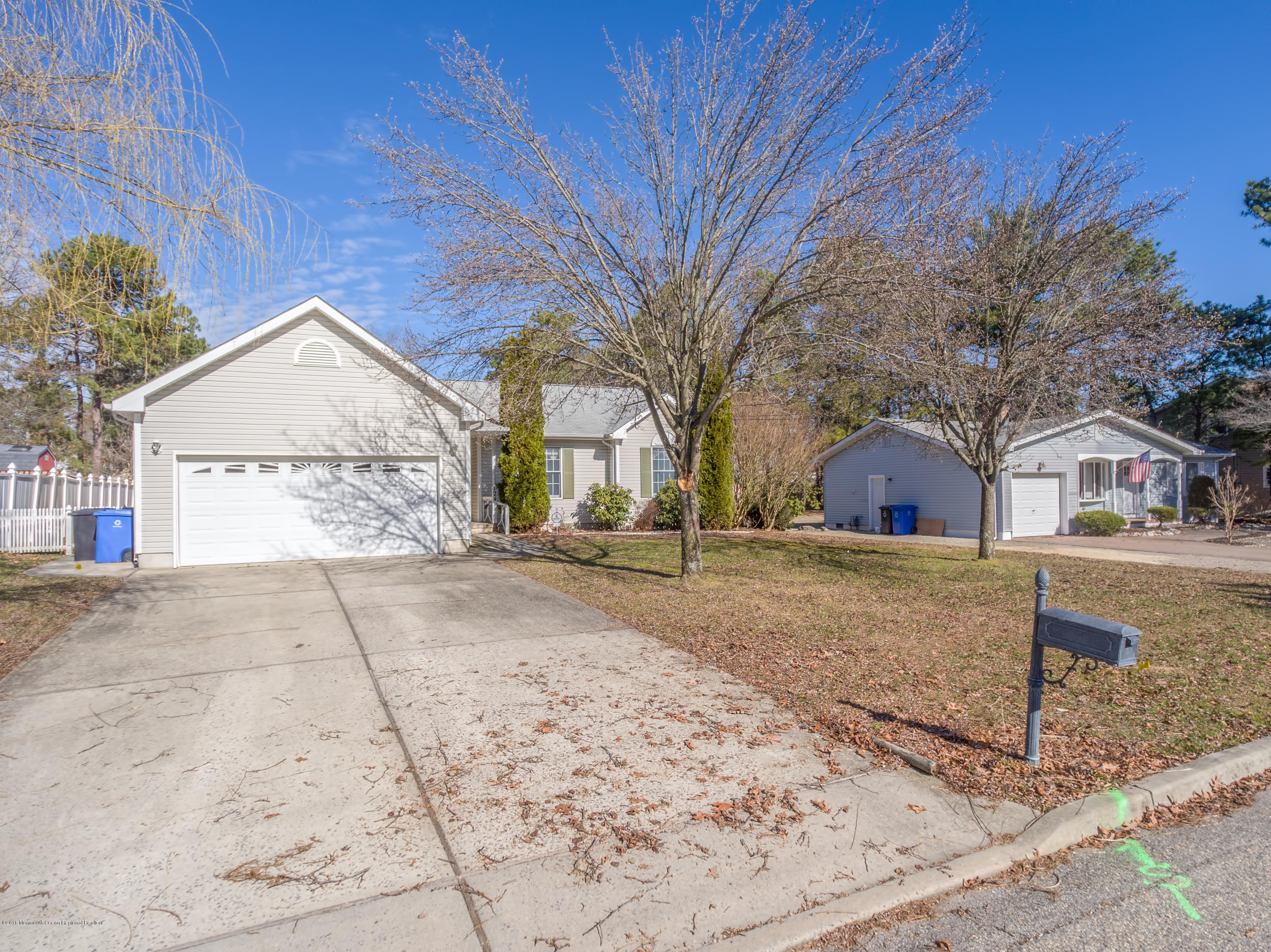 124 Marlin Road Manahawkin, NJ 08050 - Photo 28 of 34 a view of a house with a yard and large tree