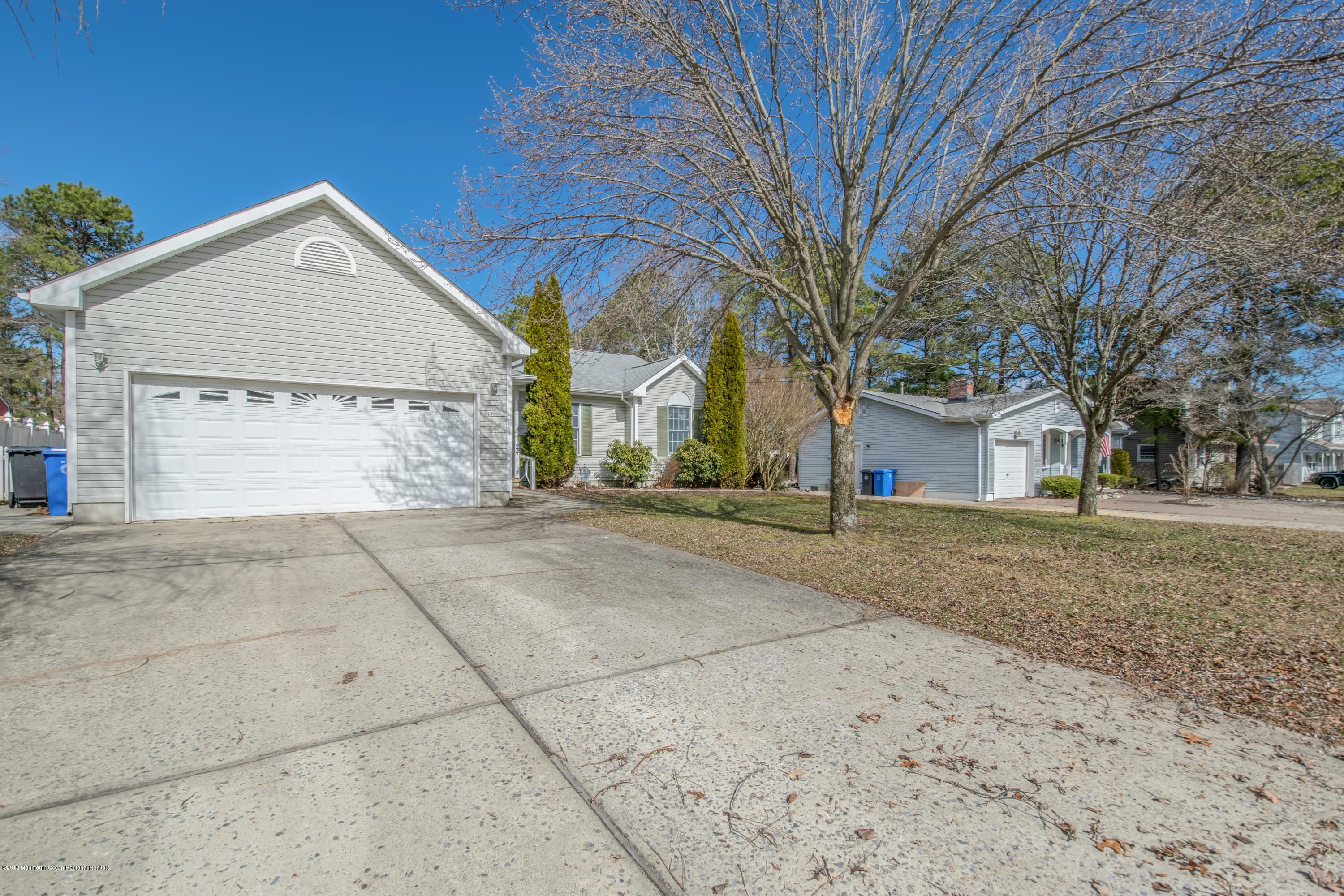 124 Marlin Road Manahawkin, NJ 08050 - Photo 29 of 34 a view of garage and yard