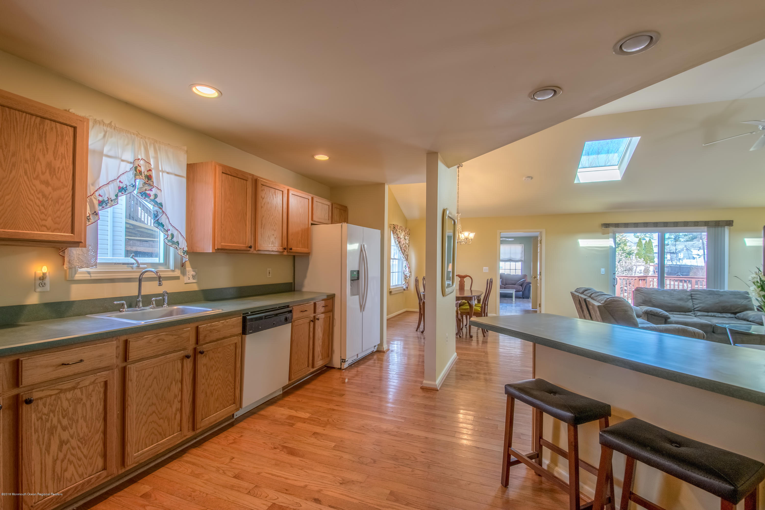 124 Marlin Road Manahawkin, NJ 08050 - Photo 4 of 34 a large kitchen with lots of counter space and a sink