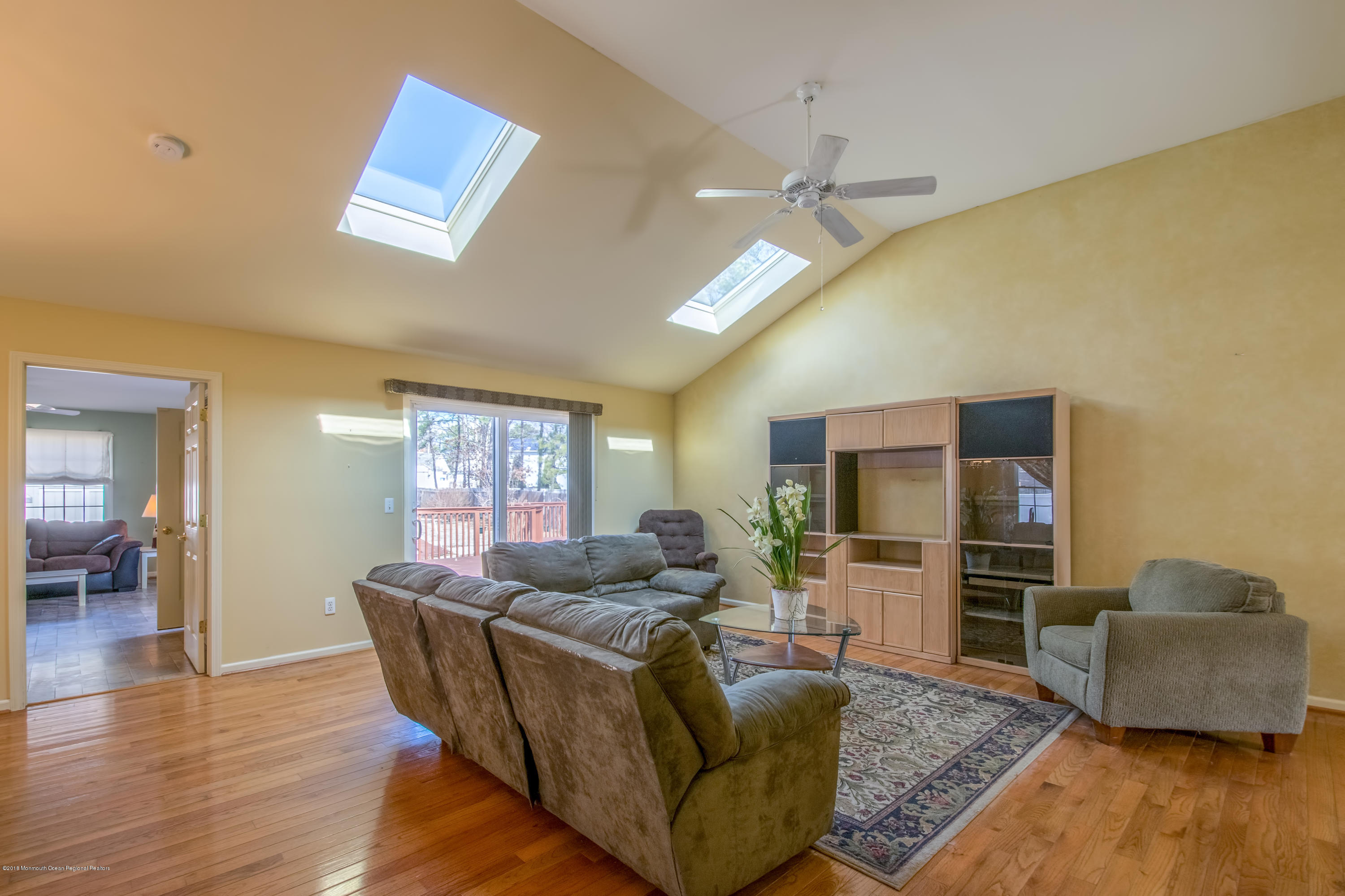124 Marlin Road Manahawkin, NJ 08050 - Photo 7 of 34 a living room with furniture and a flat screen tv