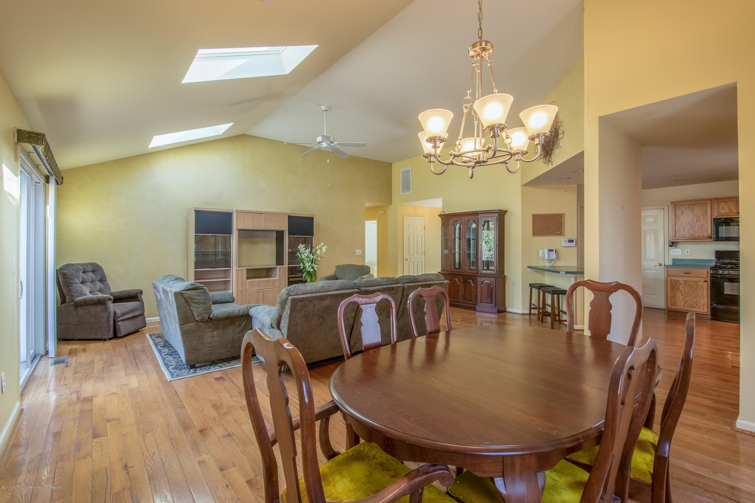 124 Marlin Road Manahawkin, NJ 08050 - Photo 8 of 34 a view of a dining room with furniture window and wooden floor