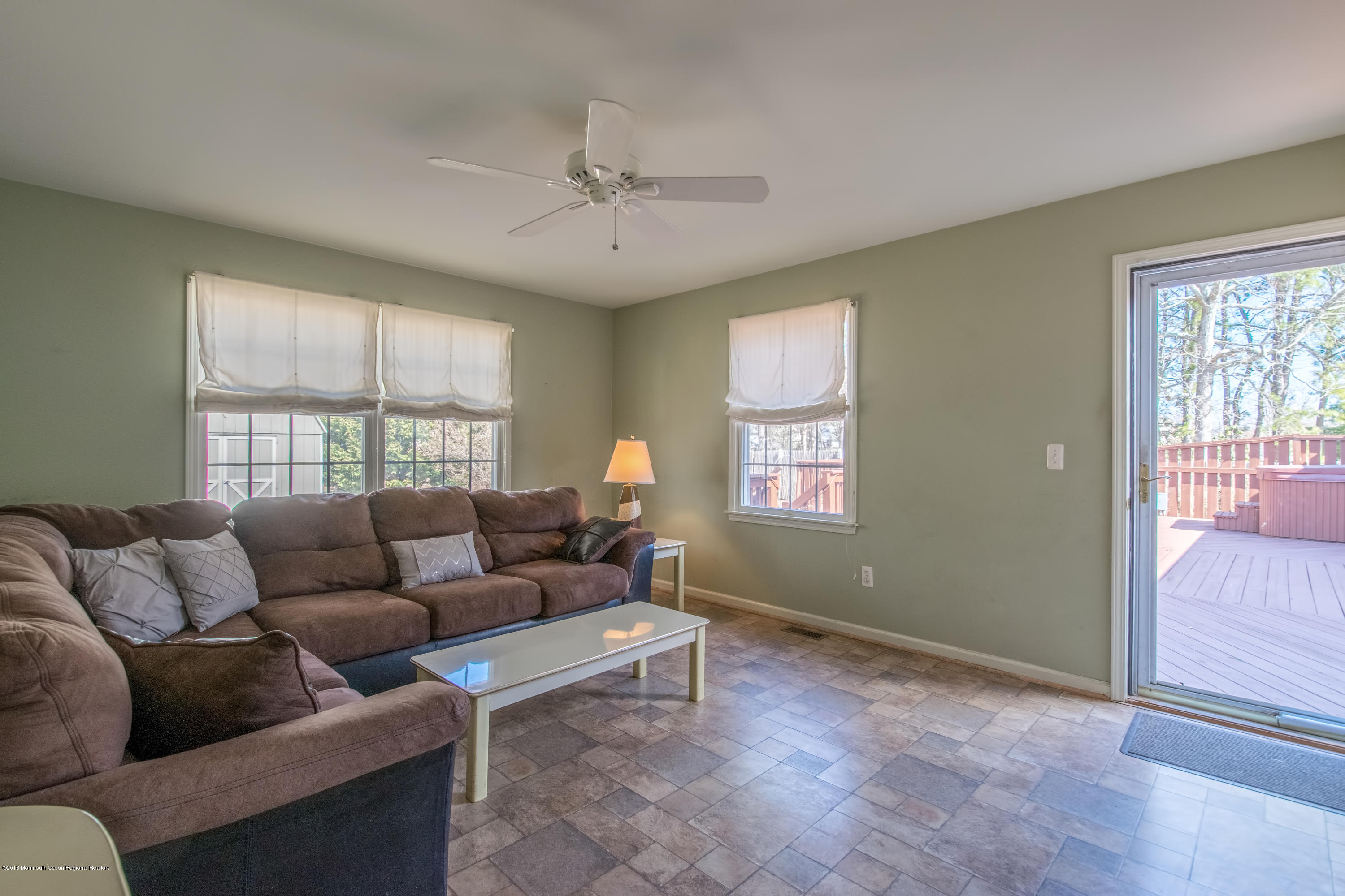 124 Marlin Road Manahawkin, NJ 08050 - Photo 9 of 34 a living room with furniture and a window
