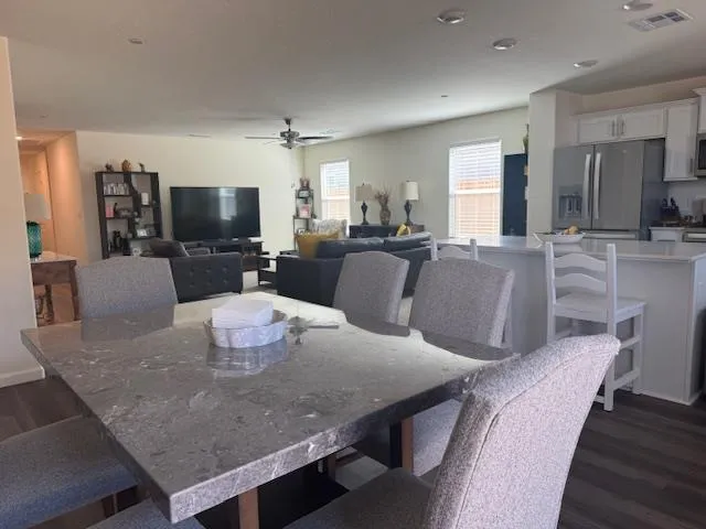 a view of a dining room with furniture