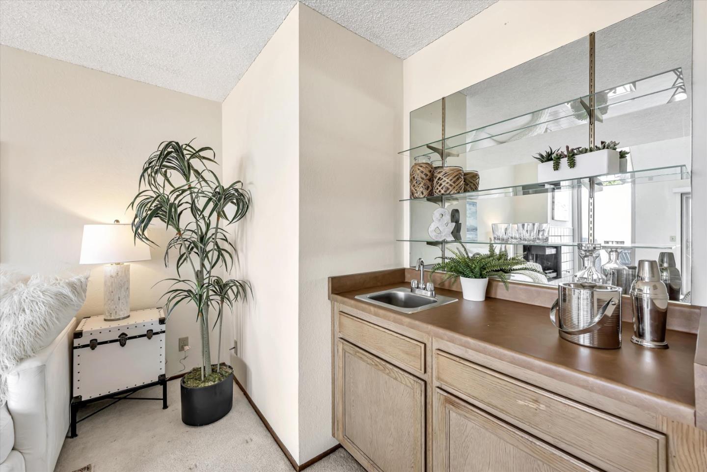 459 Roberts Road Pacifica, CA 94044 - Photo 12 of 50 a kitchen with a sink and cabinets