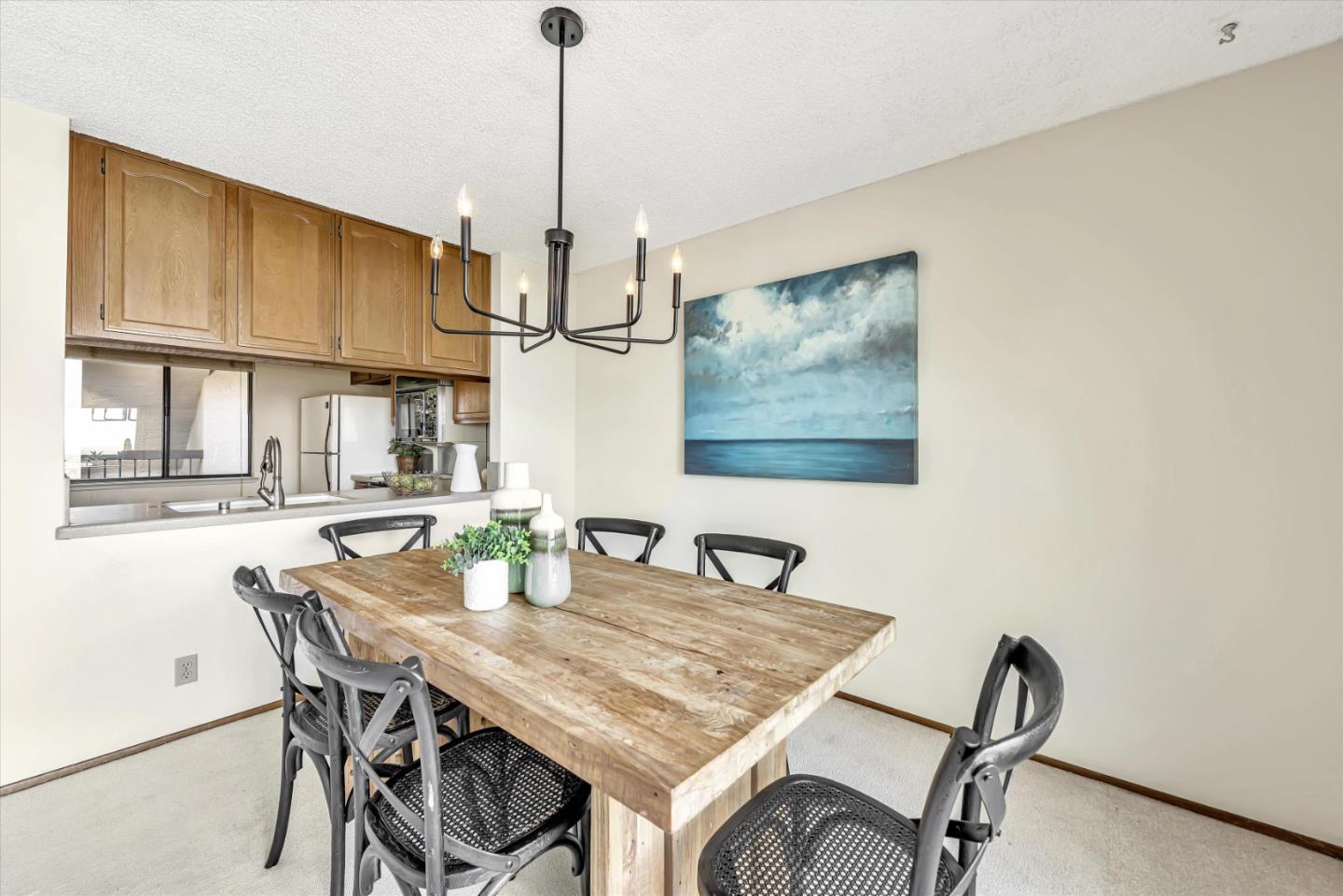 459 Roberts Road Pacifica, CA 94044 - Photo 17 of 50 a dining room with furniture and window