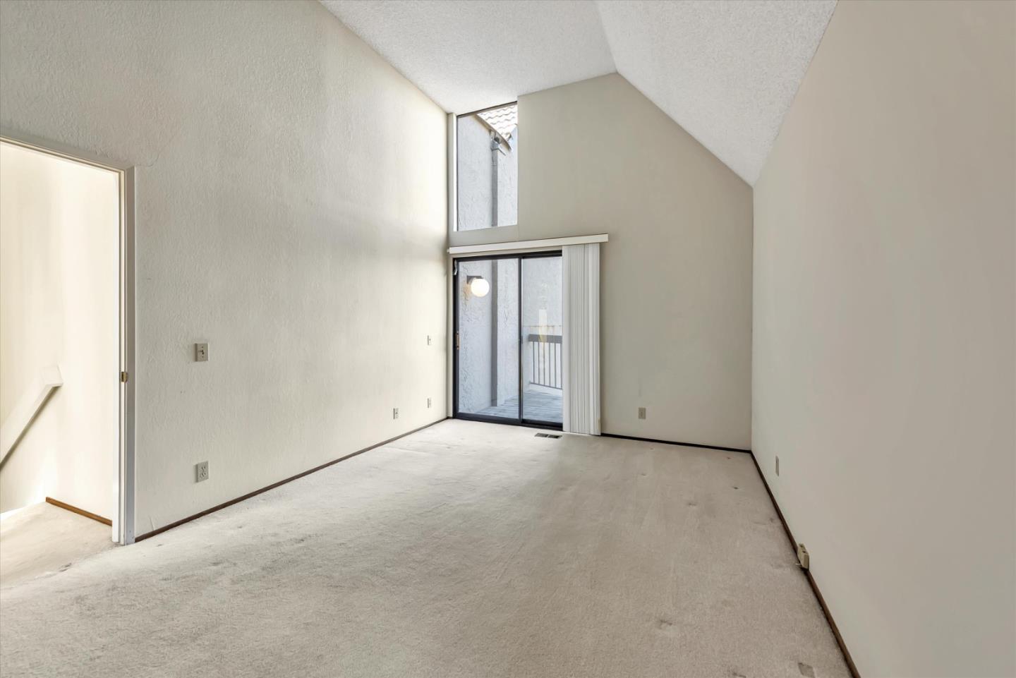 459 Roberts Road Pacifica, CA 94044 - Photo 22 of 50 an empty room with windows and closet