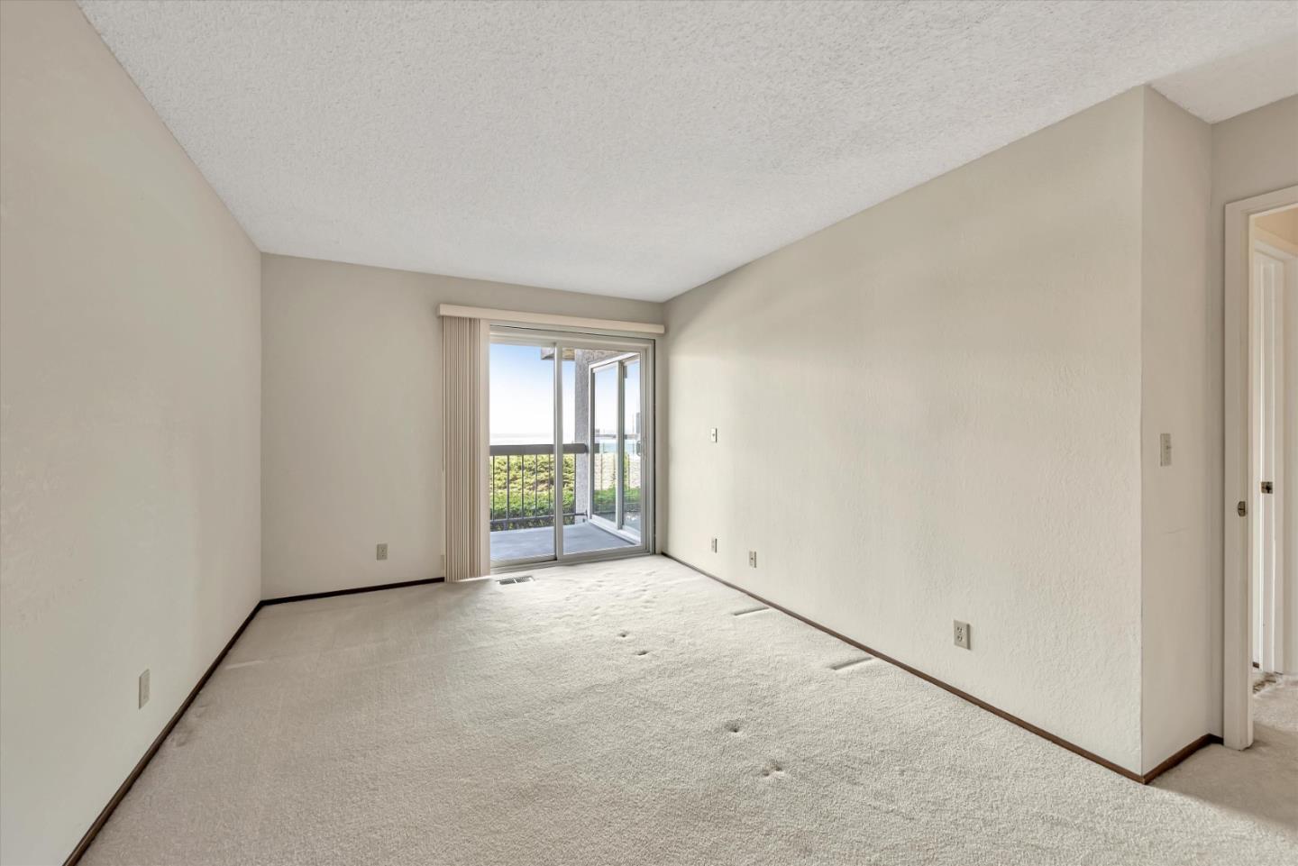 459 Roberts Road Pacifica, CA 94044 - Photo 30 of 50 an empty room with windows