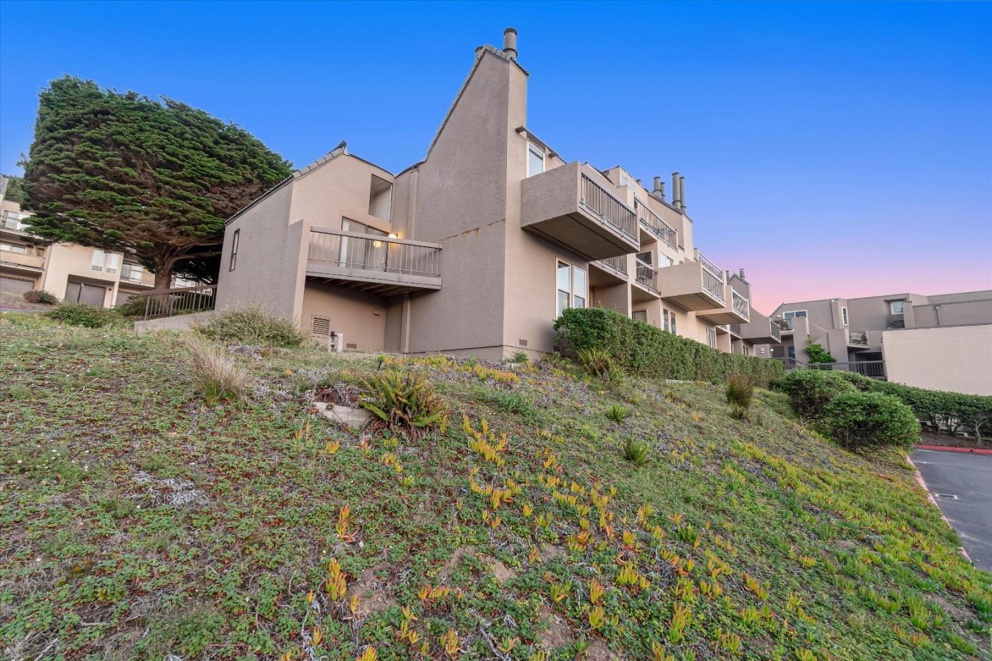 459 Roberts Road Pacifica, CA 94044 - Photo 48 of 50 front view of a house with a street