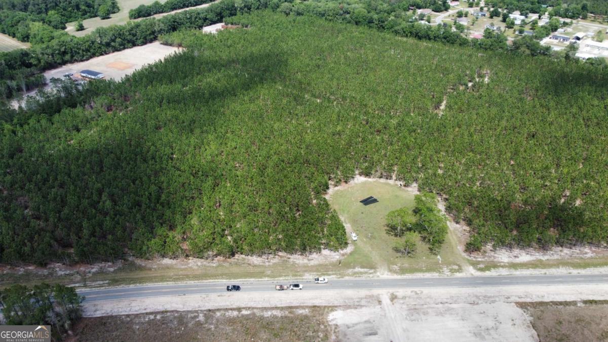 5294 Owens Road Blackshear, GA 31516 - Photo 2 of 8 a view of a outdoor space and a yard
