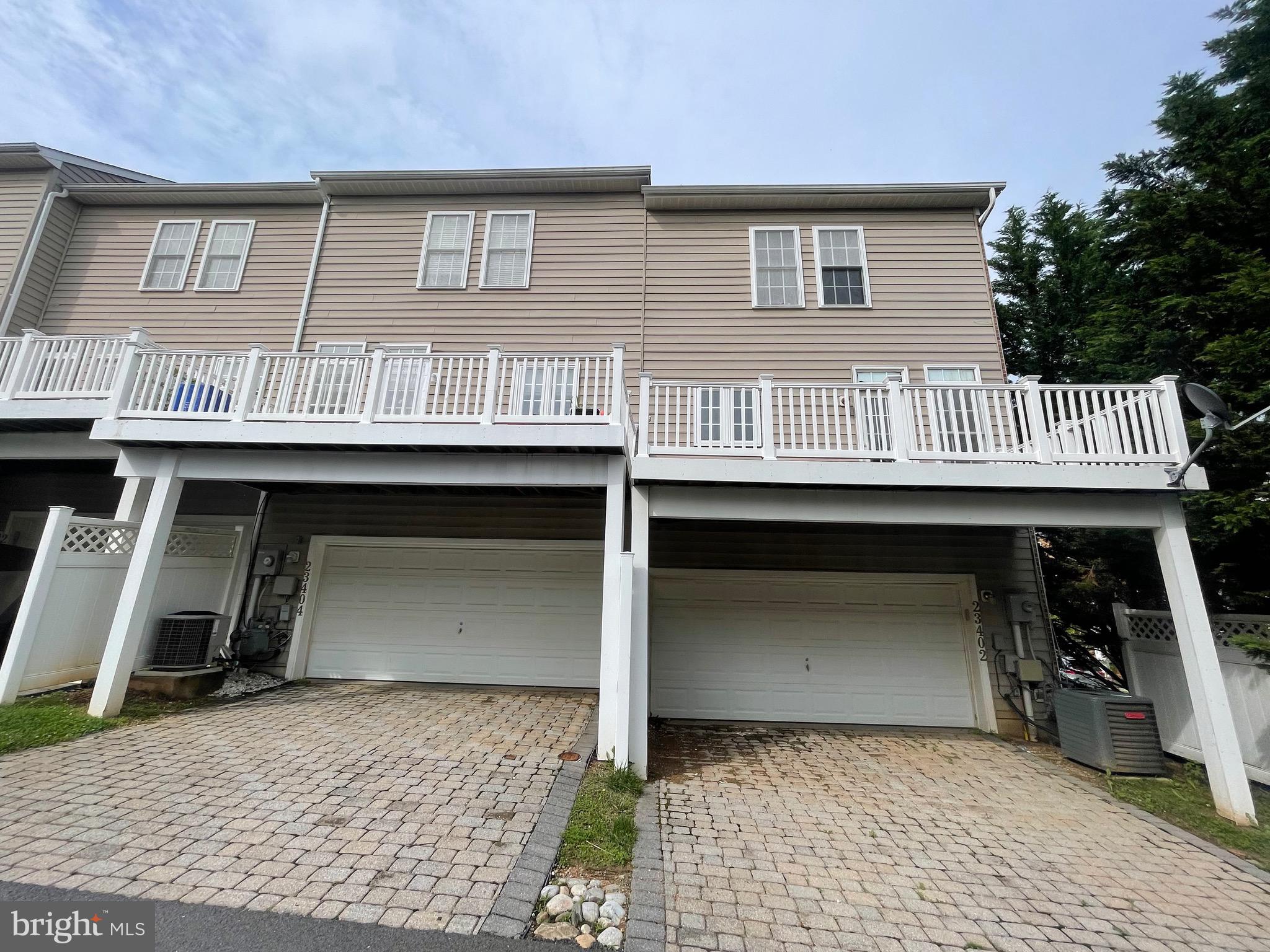 23402 Winemiller Way Clarksburg, MD 20871 - Photo 3 of 22 a front view of a house