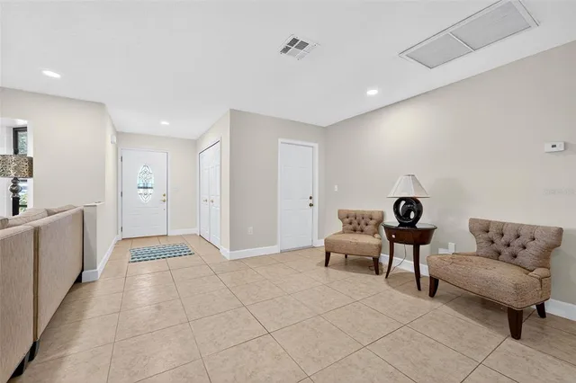 a living room with furniture and a couch