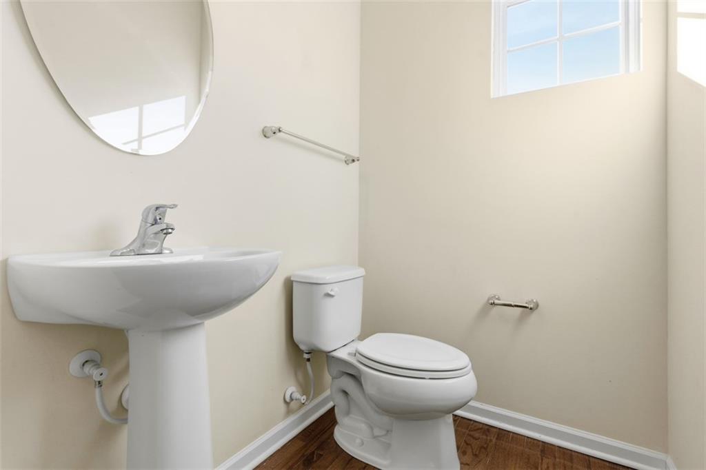 3001 Pointe View Drive Mars, PA 16046 - Photo 14 of 48 a bathroom with a sink mirror and toilet