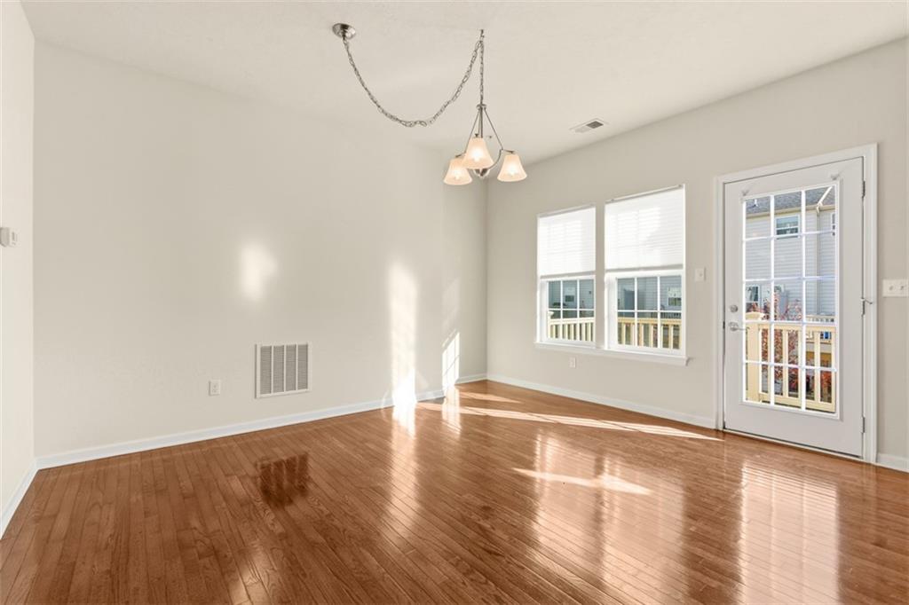 3001 Pointe View Drive Mars, PA 16046 - Photo 21 of 48 a view of an empty room with wooden floor and a window