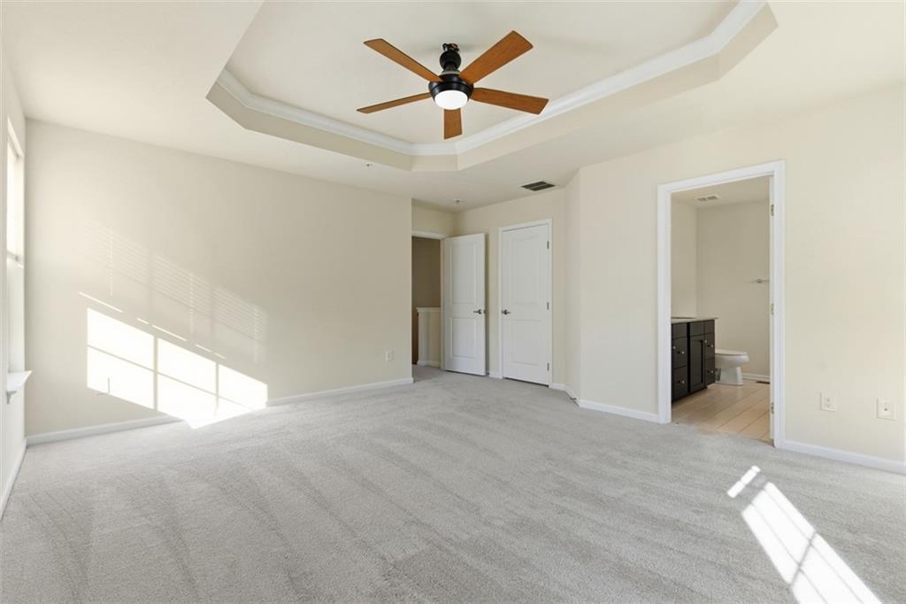 3001 Pointe View Drive Mars, PA 16046 - Photo 23 of 48 an empty room with chandelier fan and windows
