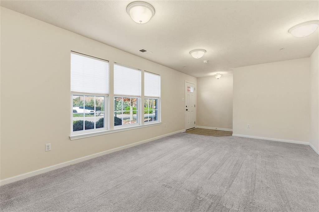 3001 Pointe View Drive Mars, PA 16046 - Photo 8 of 48 an empty room with windows