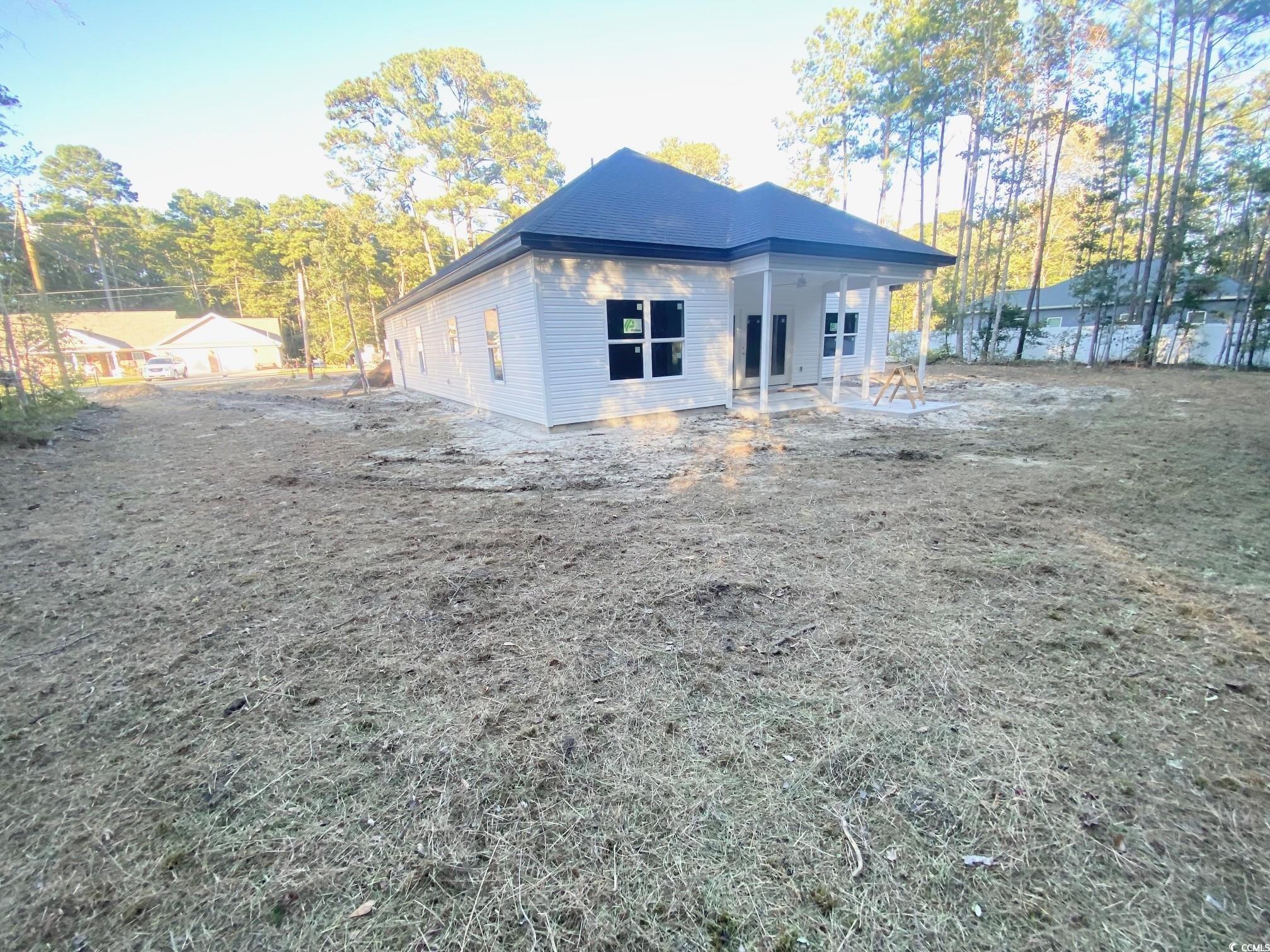 5553 Grape Arbor Lane Myrtle Beach, SC 29588 - Photo 34 of 35 Back of house with a patio area