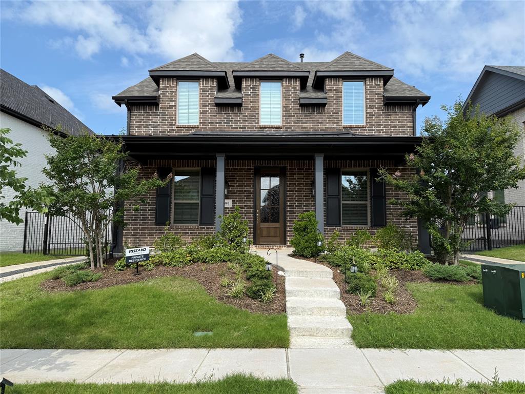 1840 Rosedale Avenue Van Alstyne, TX 75495 - Photo 1 of 24 Brick exterior with dark trim and shutters, featuring a covered front porch supported by columns