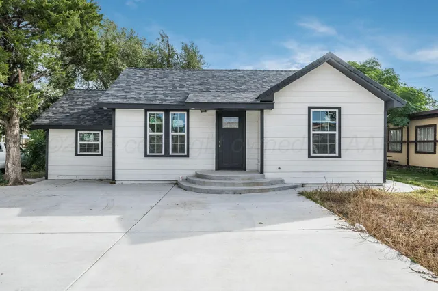 a view of front of house with garage