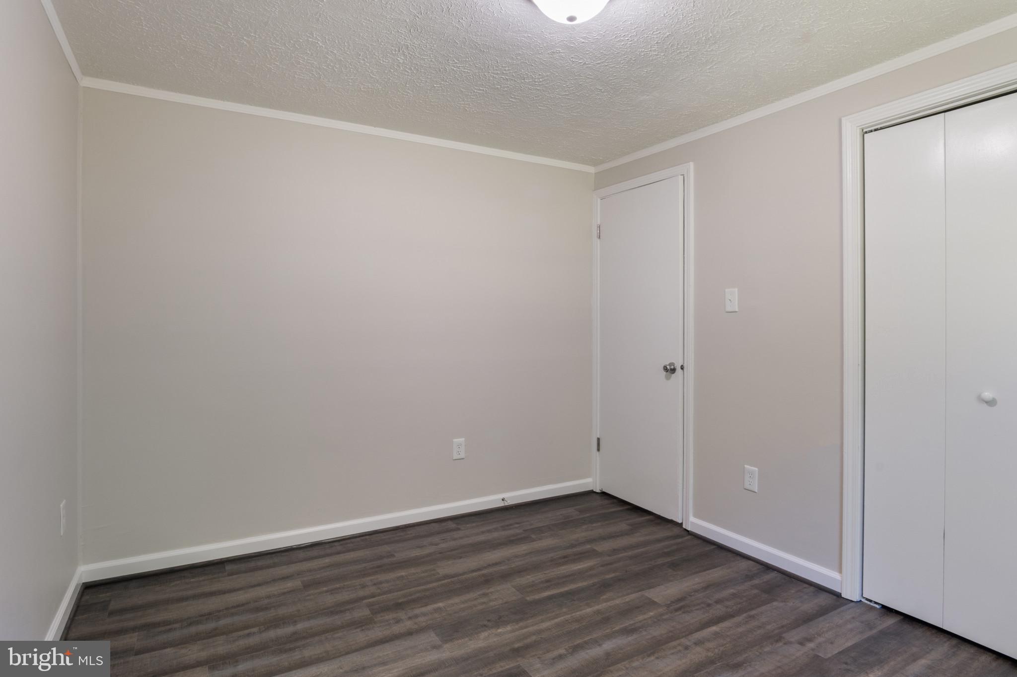 14408 Old Ridge Road Beaverdam, VA 23015 - Photo 19 of 26 a view of an empty room with wooden floor