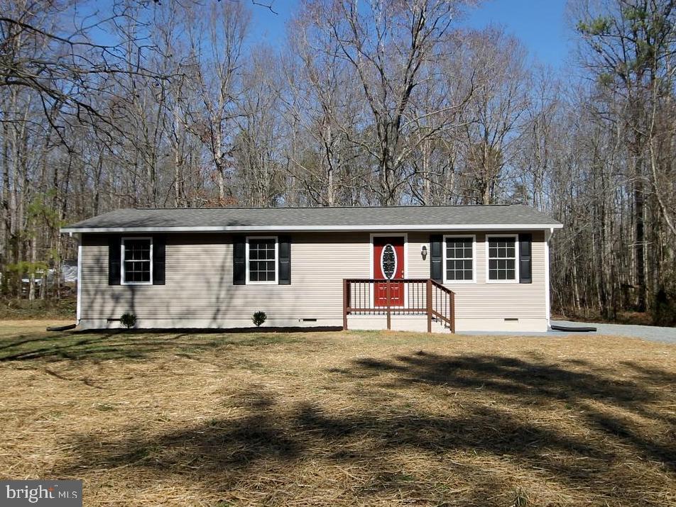 14408 Old Ridge Road Beaverdam, VA 23015 - Photo 2 of 26 a house that has a big yard