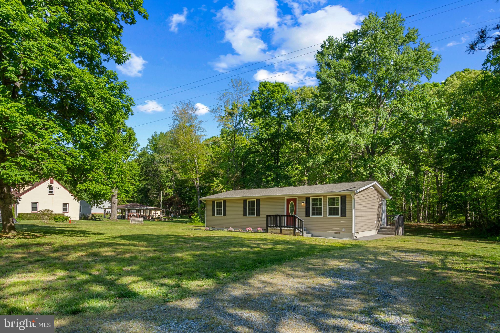14408 Old Ridge Road Beaverdam, VA 23015 - Photo 26 of 26 a front view of a house with a garden