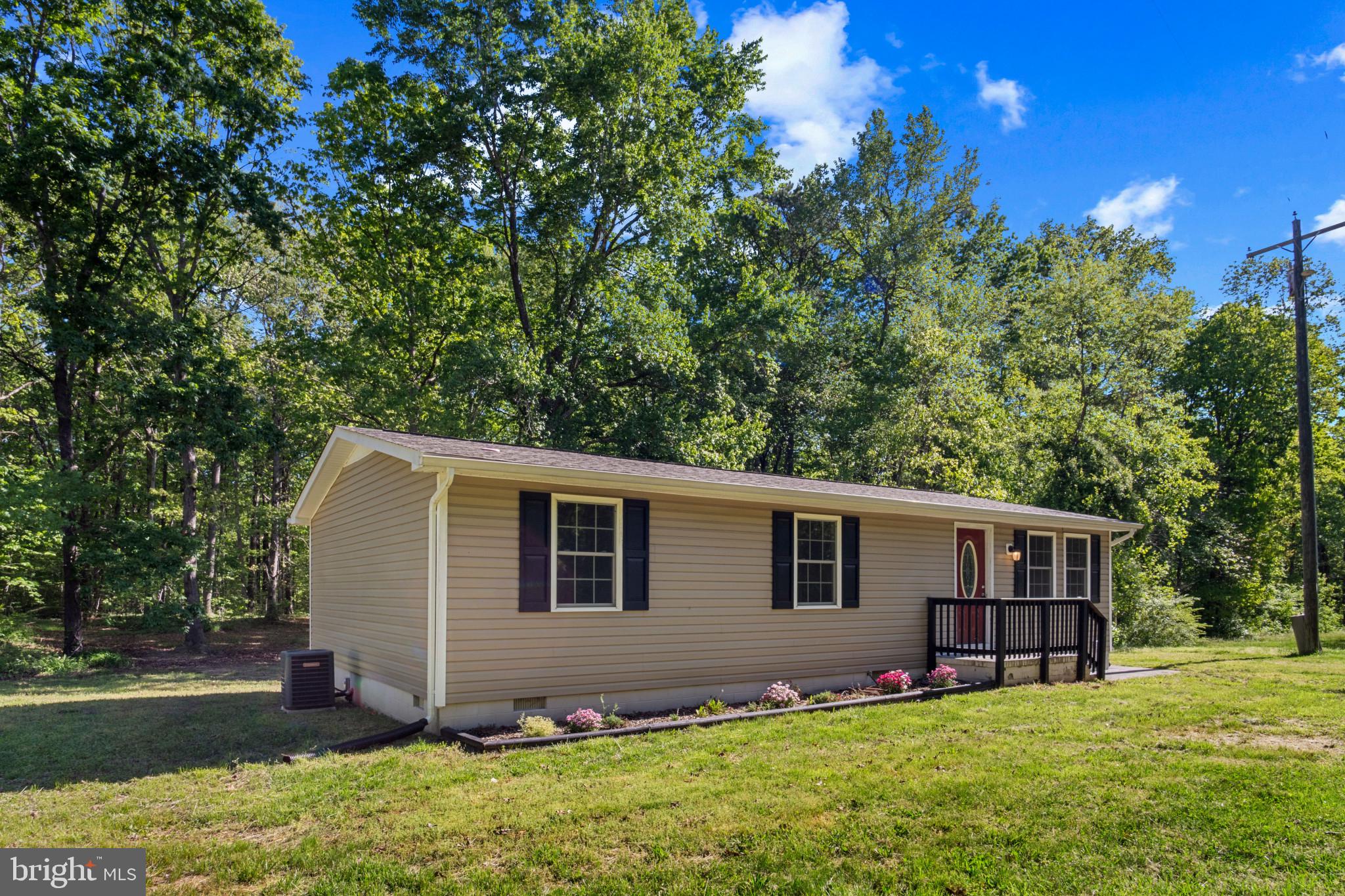 14408 Old Ridge Road Beaverdam, VA 23015 - Photo 4 of 26 a view of a house with a yard