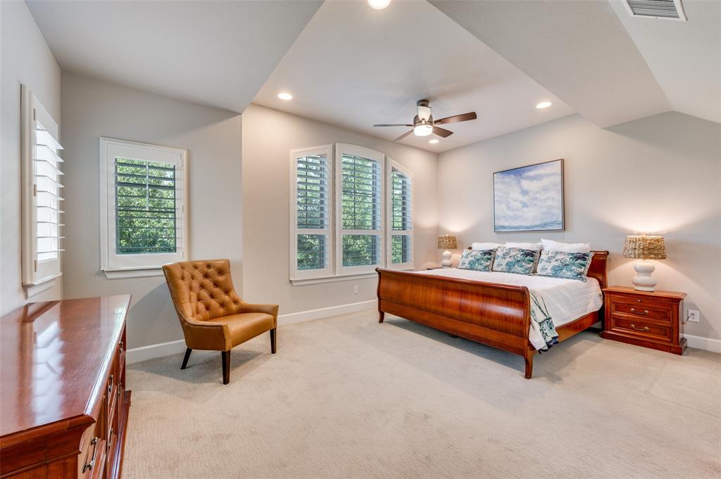 7153 Copperleaf Drive Dallas, TX 75231 - Photo 11 of 26 Bedroom with light colored carpet, recessed lighting, ceiling fan, and vaulted ceiling