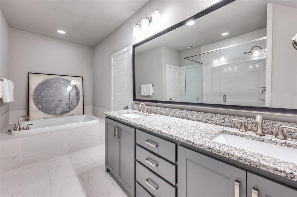 7153 Copperleaf Drive Dallas, TX 75231 - Photo 13 of 26 Full bathroom featuring a stall shower, a garden tub, double vanity, recessed lighting, and light marble finish flooring