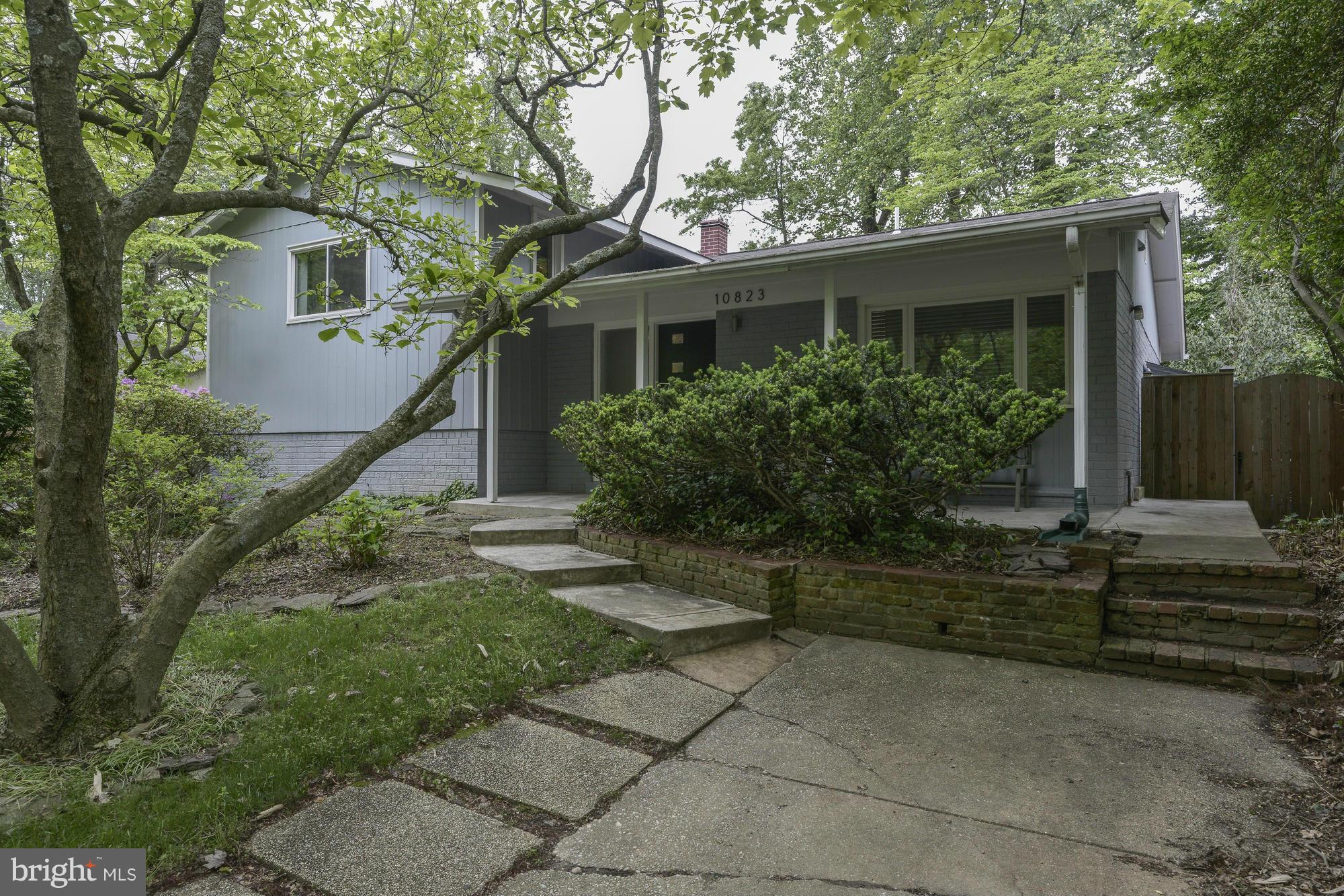 10823 Margate Road Silver Spring, MD 20901 - Photo 1 of 30 a front view of a house with garden