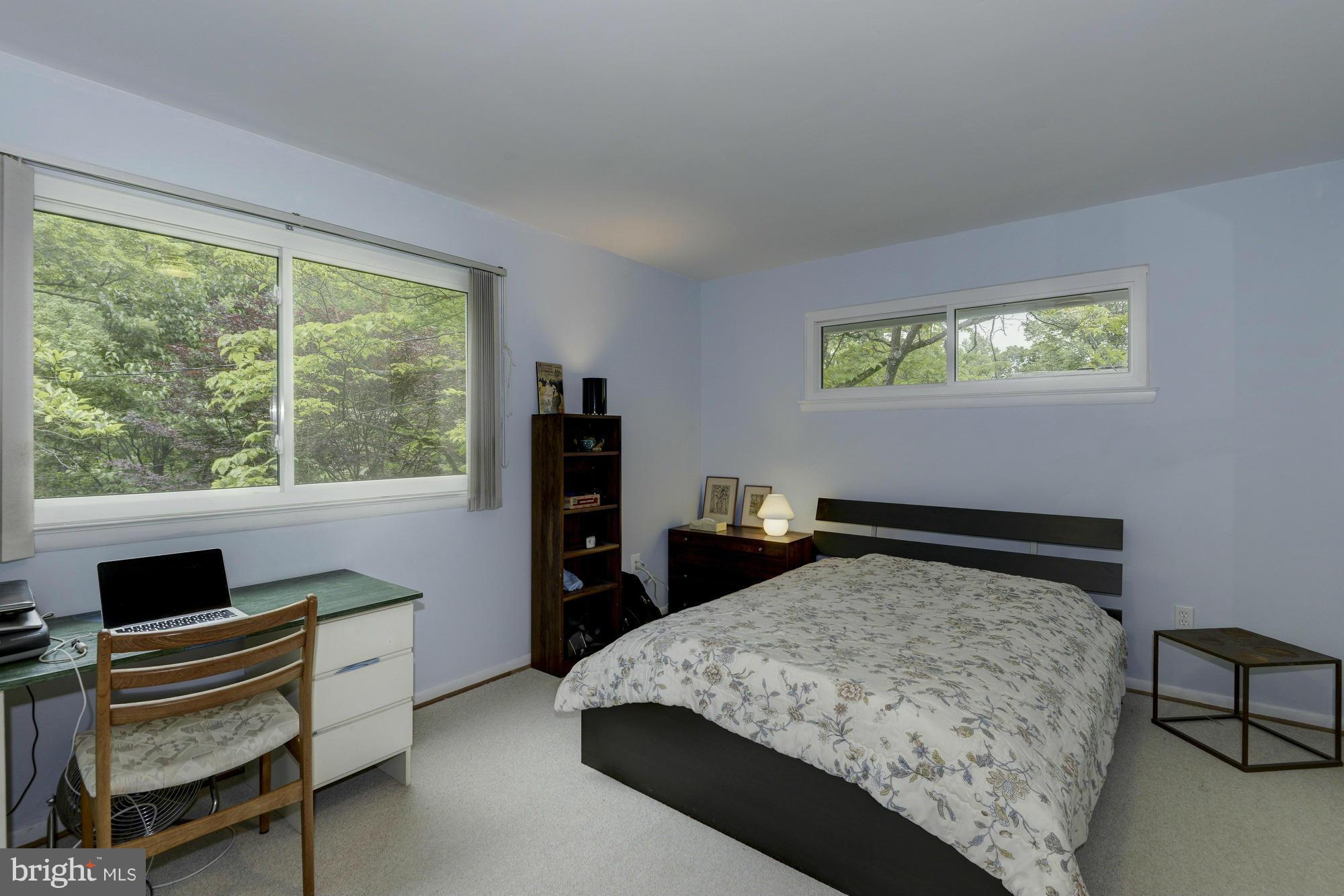 10823 Margate Road Silver Spring, MD 20901 - Photo 20 of 30 a bedroom with a bed and a window