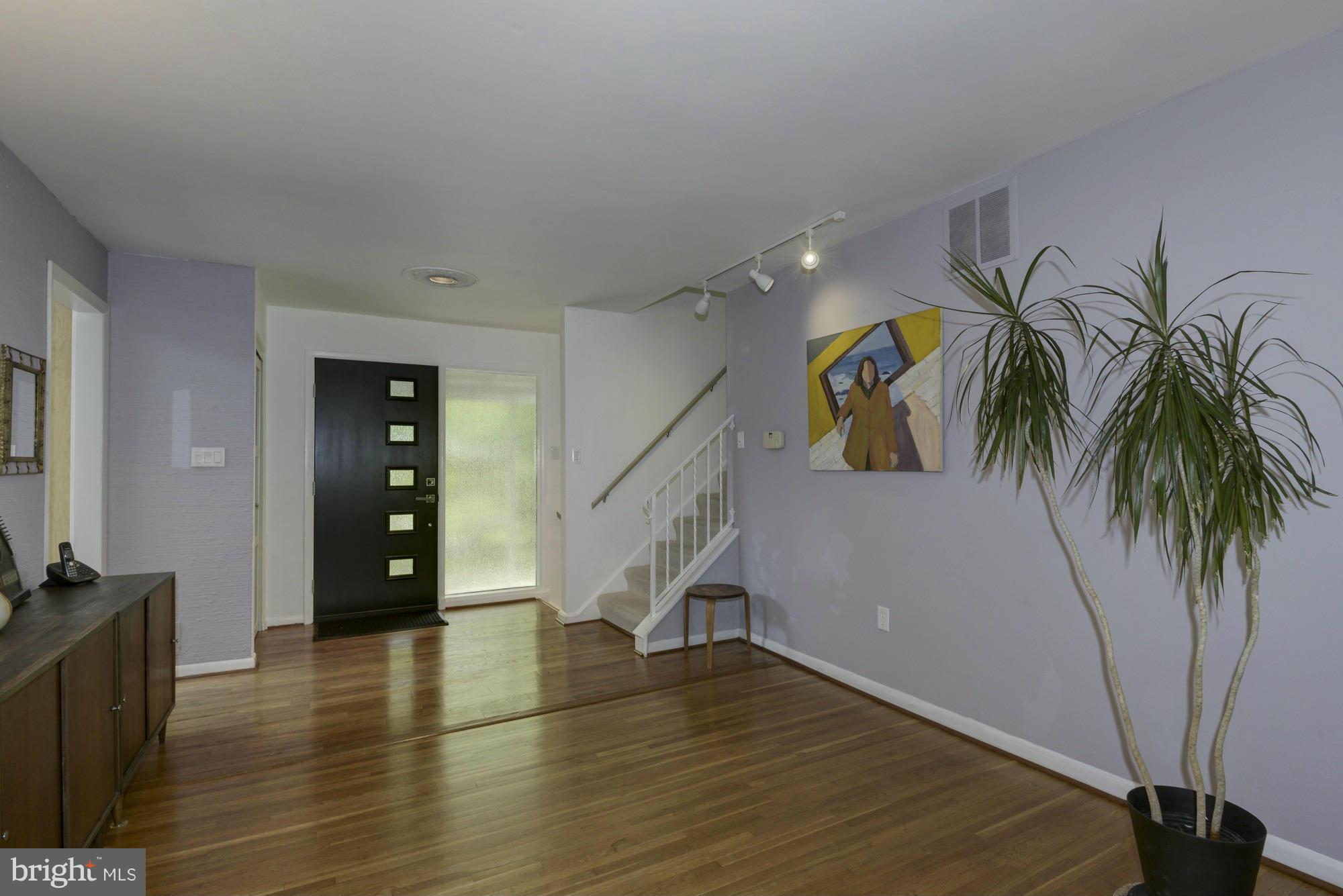 10823 Margate Road Silver Spring, MD 20901 - Photo 4 of 30 a view of entryway and hall with wooden floor