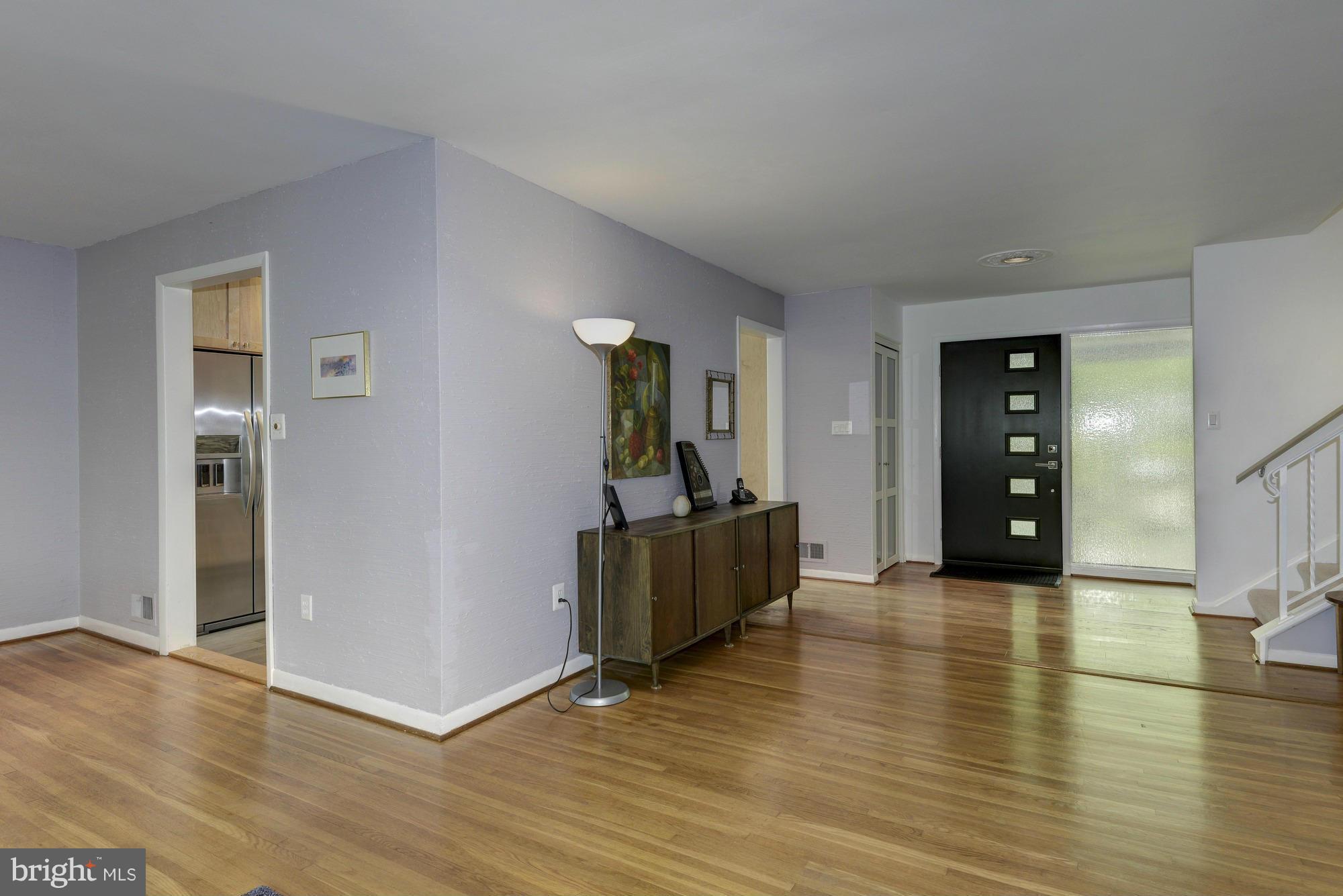 10823 Margate Road Silver Spring, MD 20901 - Photo 5 of 30 a living room with furniture and wooden floor