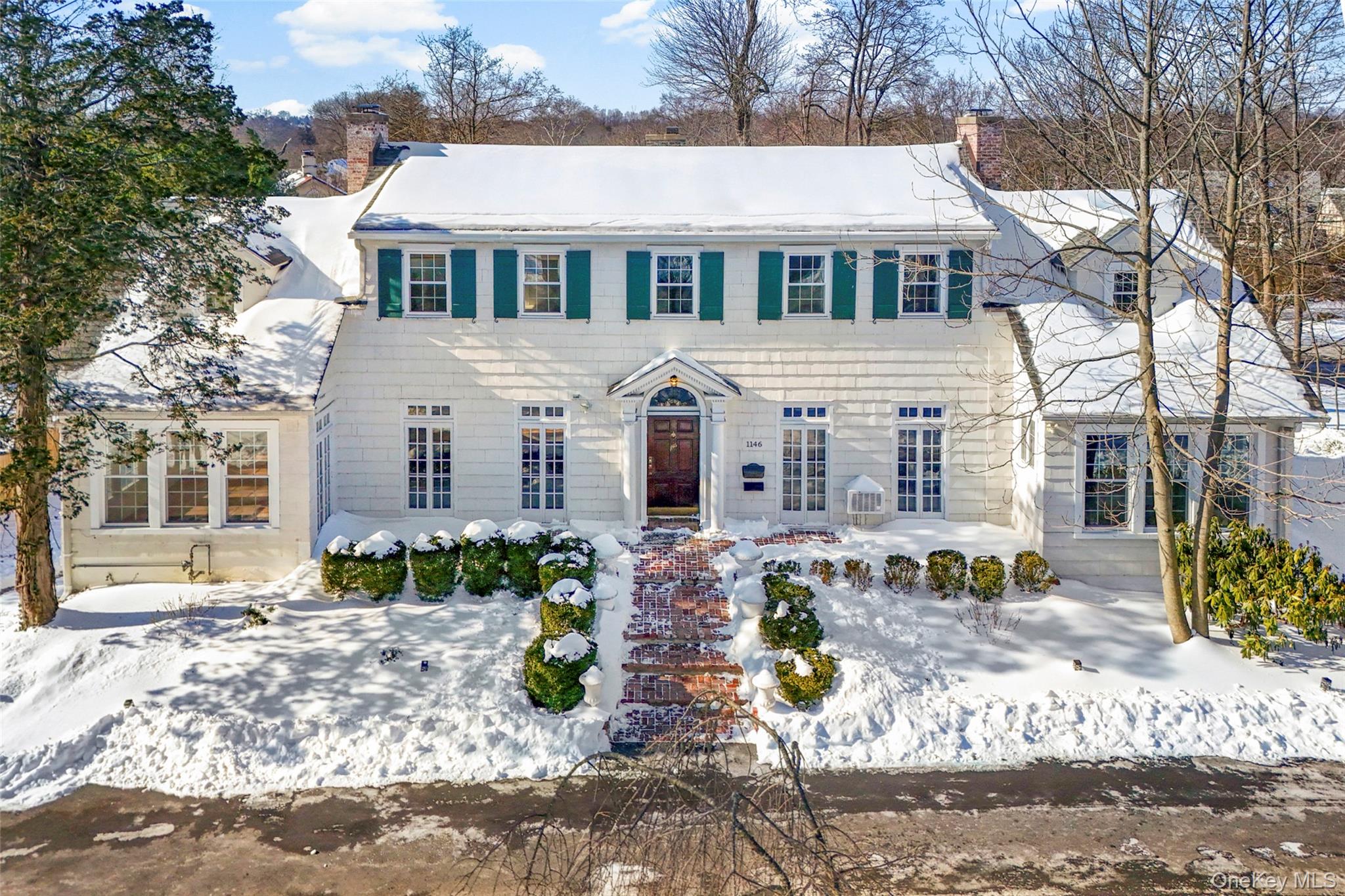 1146 North Avenue New Rochelle, NY 10804 - Photo 1 of 50 front view of a house with a yard