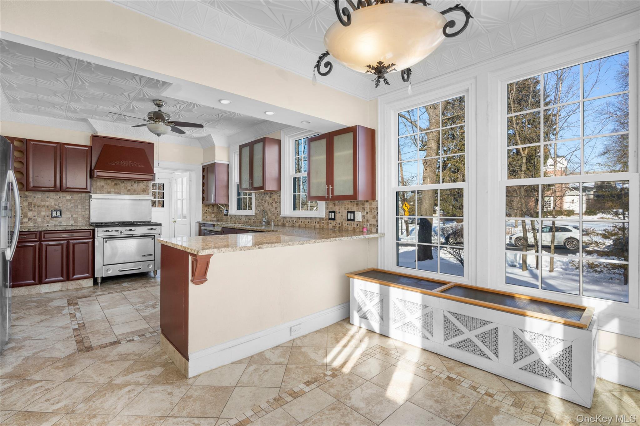 1146 North Avenue New Rochelle, NY 10804 - Photo 22 of 50 a kitchen with stainless steel appliances granite countertop a stove and a sink