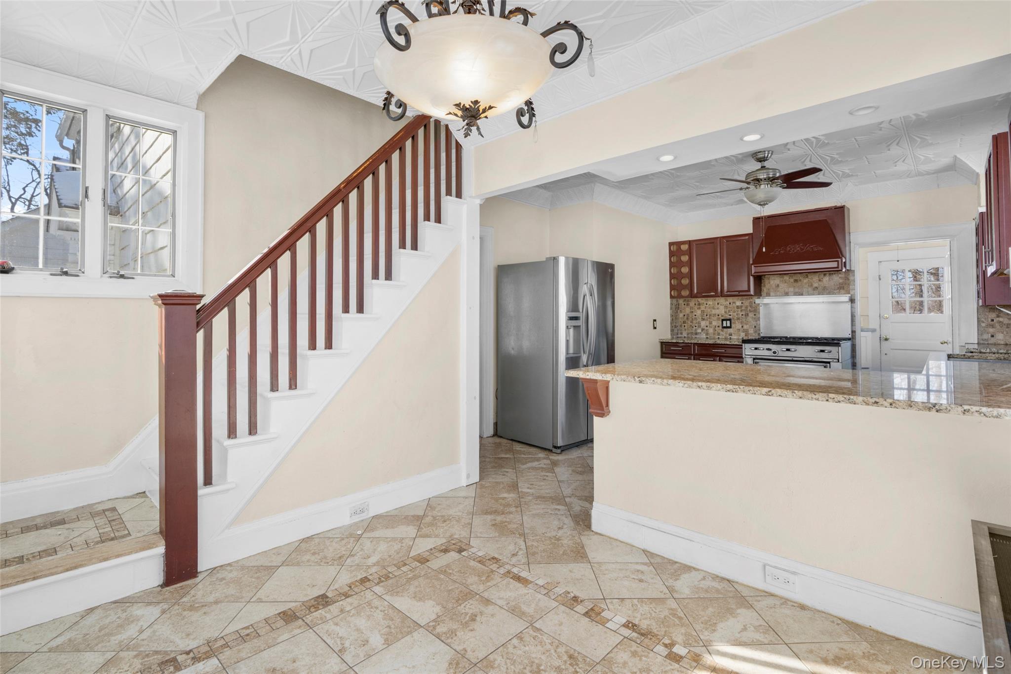 1146 North Avenue New Rochelle, NY 10804 - Photo 24 of 50 a view of a kitchen with furniture and staircase